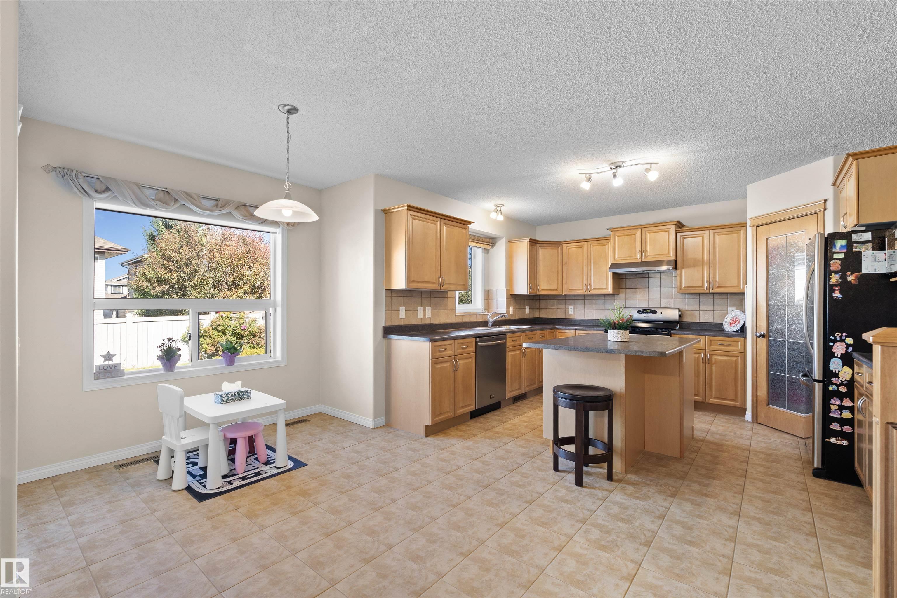 Photo 8 at 20616 56 Avenue NW, The Hamptons, Edmonton