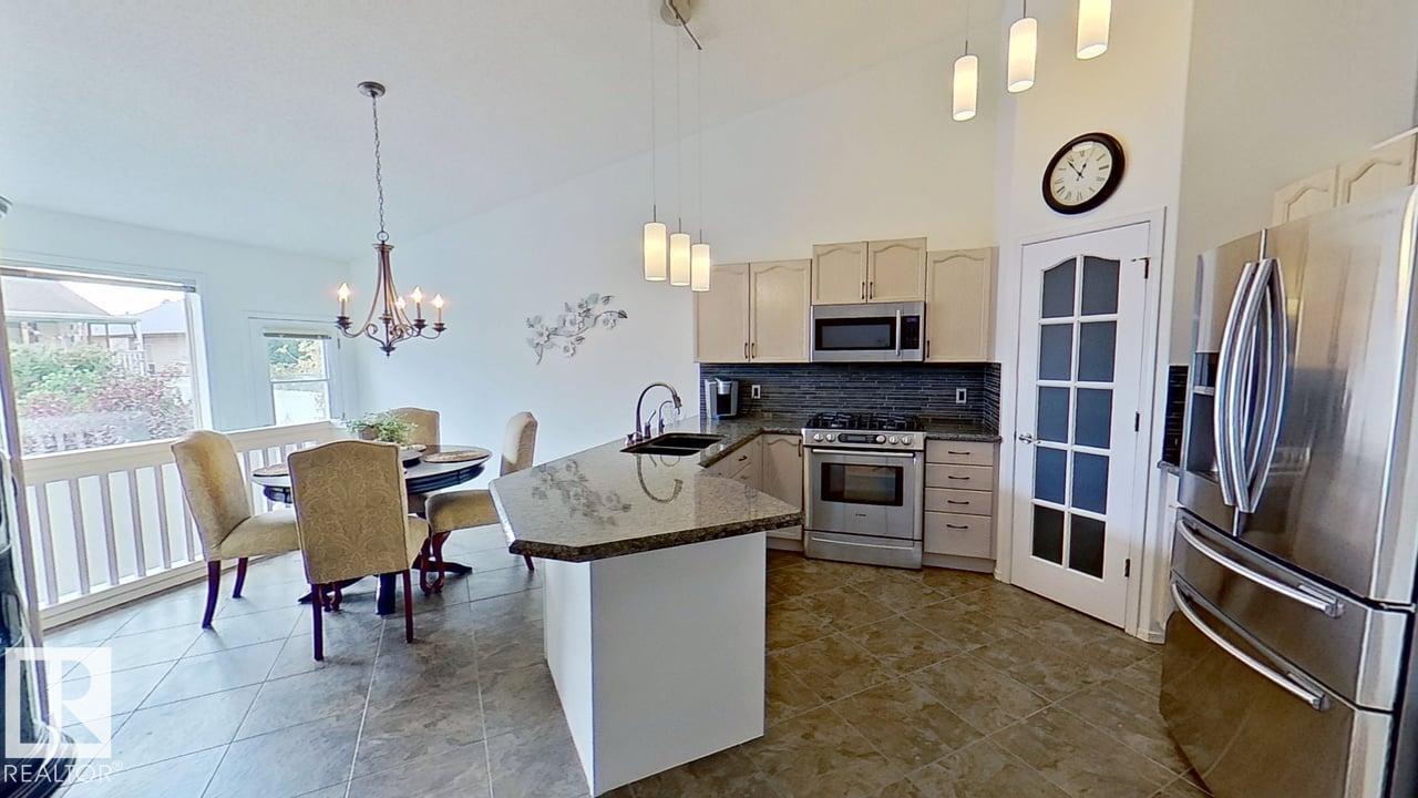 Photo 11 at 3115 135 Avenue NW, Belmont, Edmonton