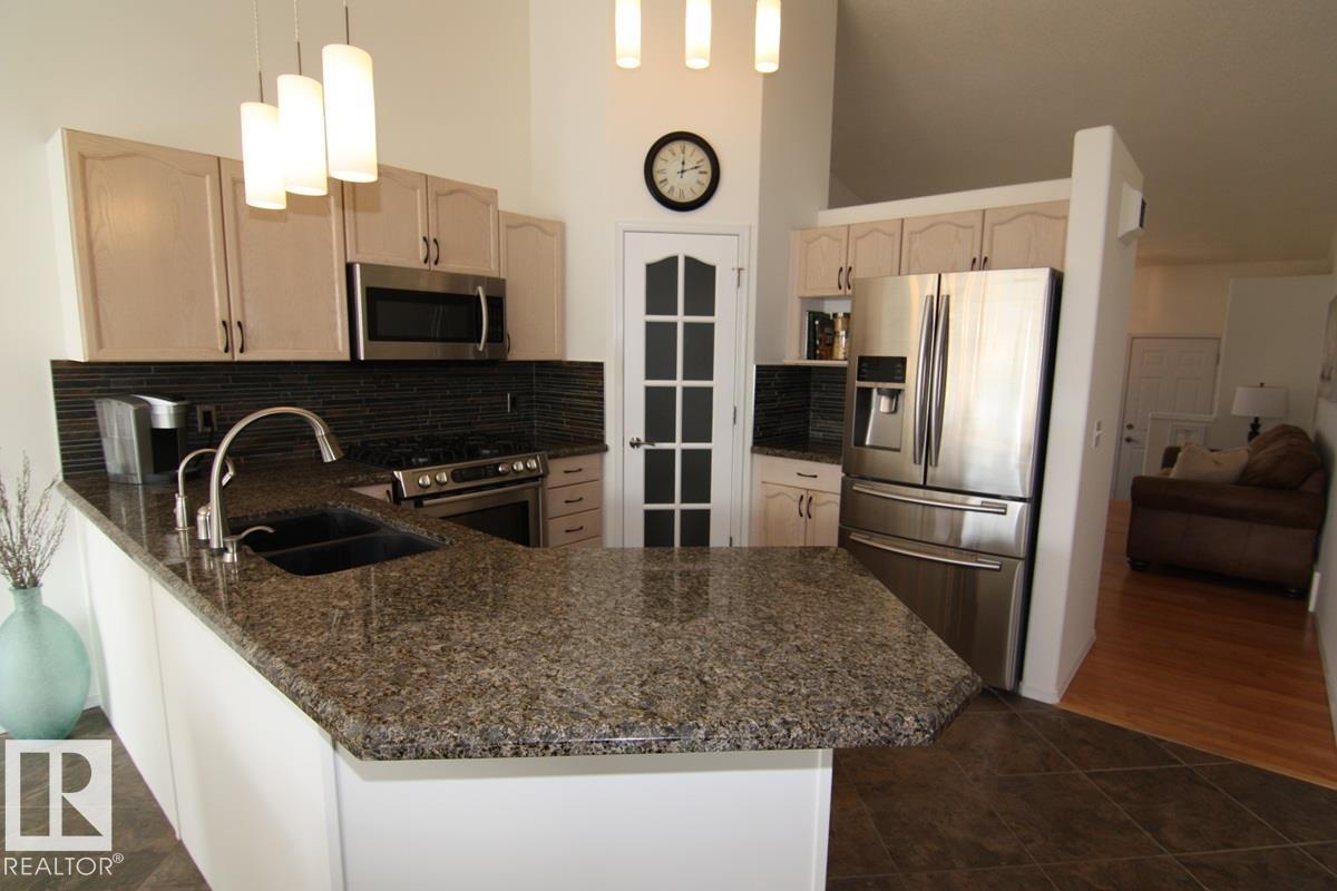 Photo 8 at 3115 135 Avenue NW, Belmont, Edmonton