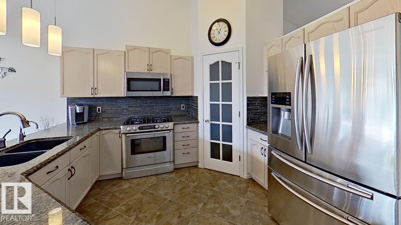 Photo 9 at 3115 135 Avenue NW, Belmont, Edmonton