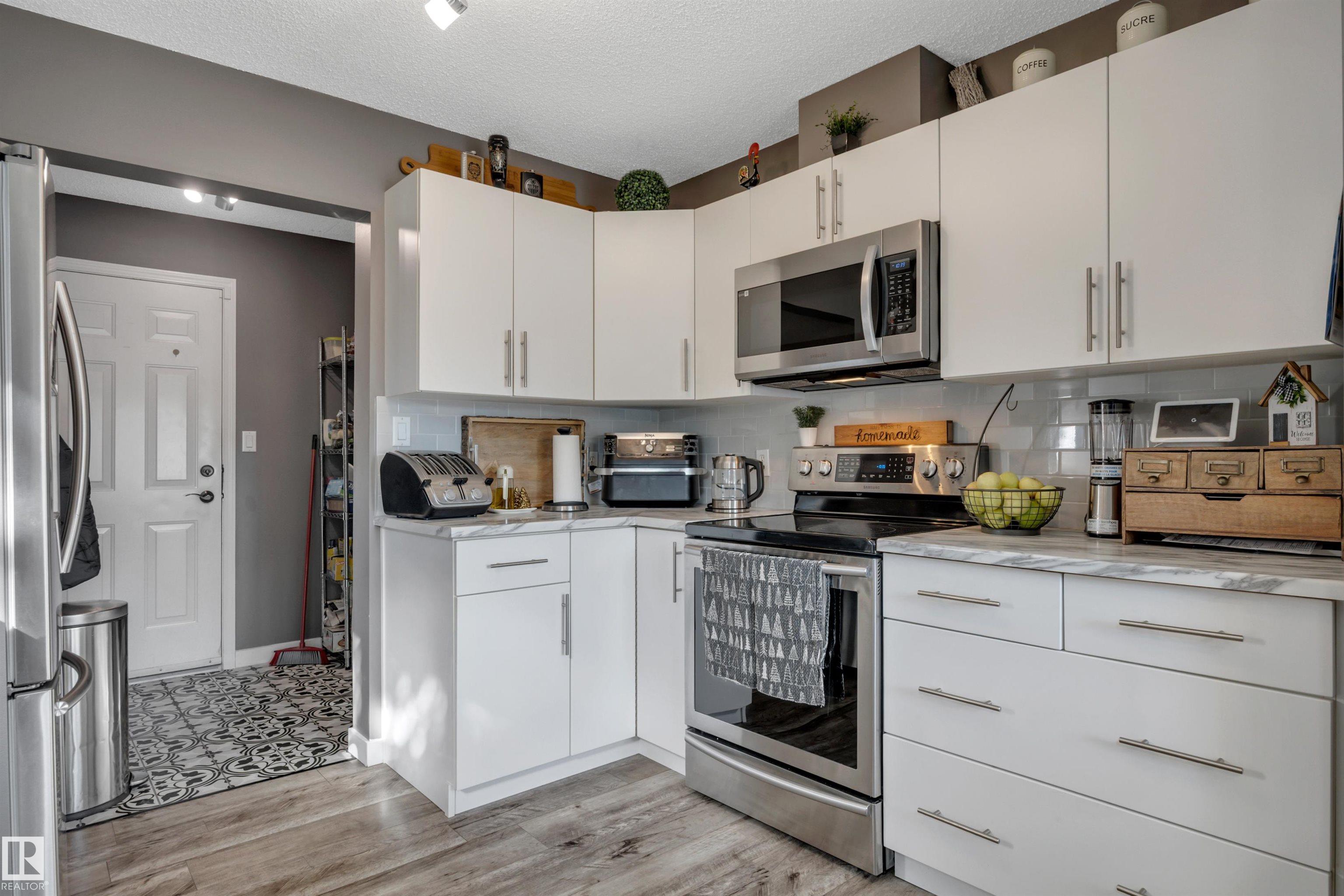 Photo 13 at 13 - 6608 158 Avenue NW, Ozerna, Edmonton