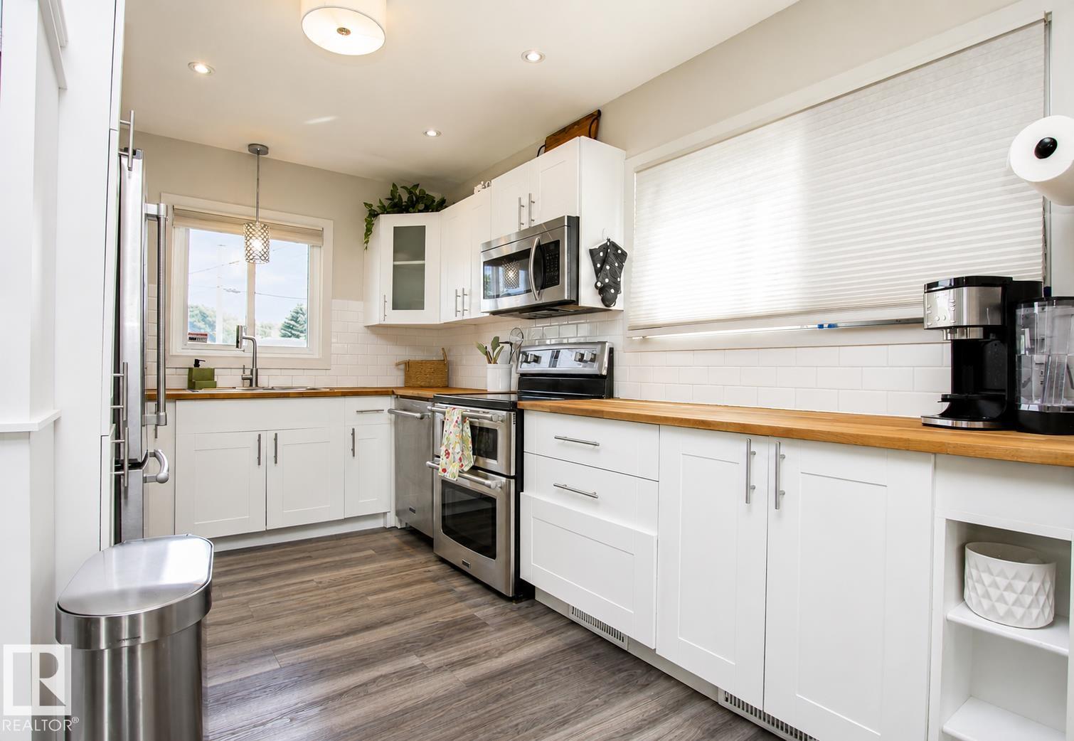 Photo 9 at 12231 55 Street NW, Newton, Edmonton
