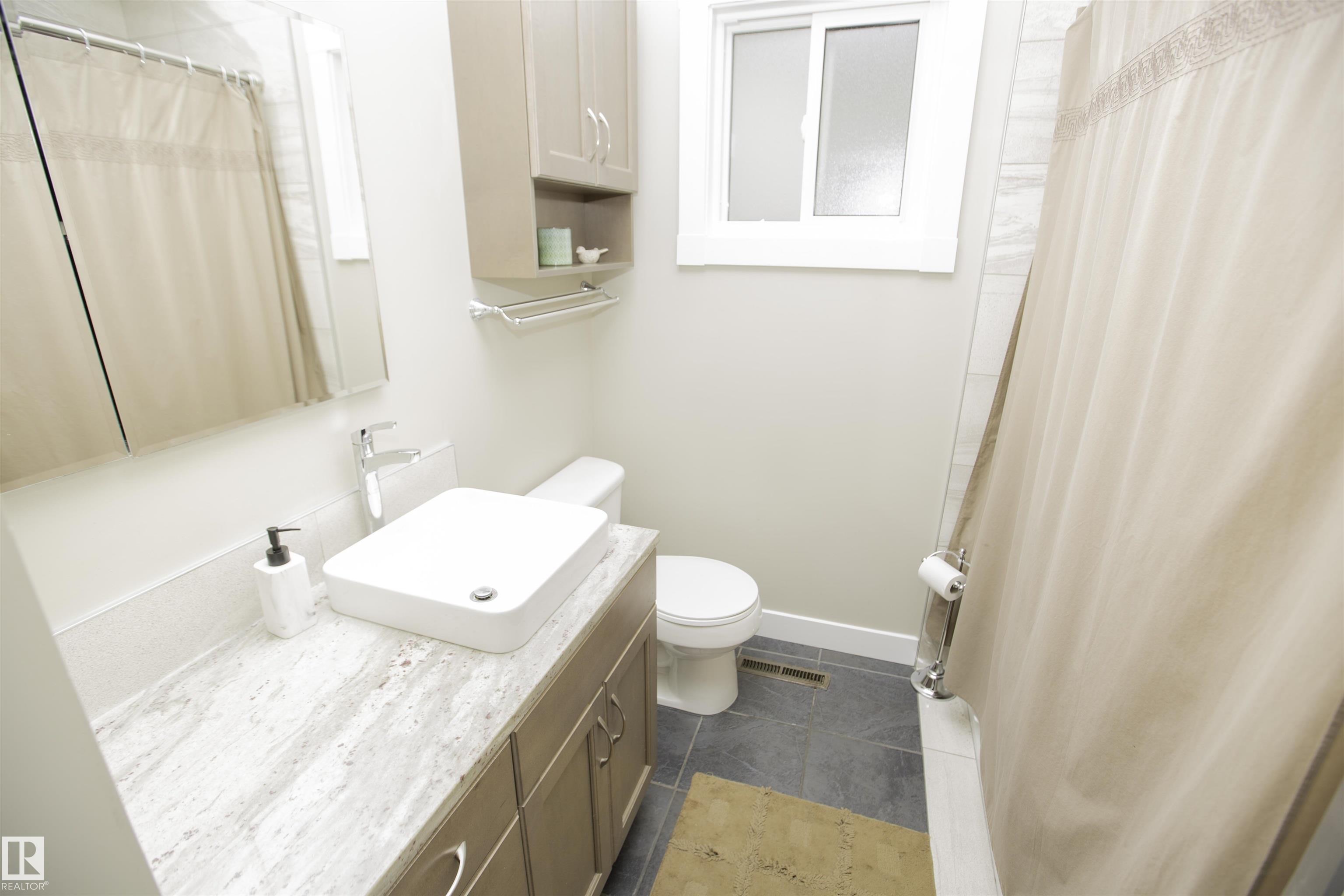 Photo 12 at 9107 58 Street NW, Ottewell, Edmonton