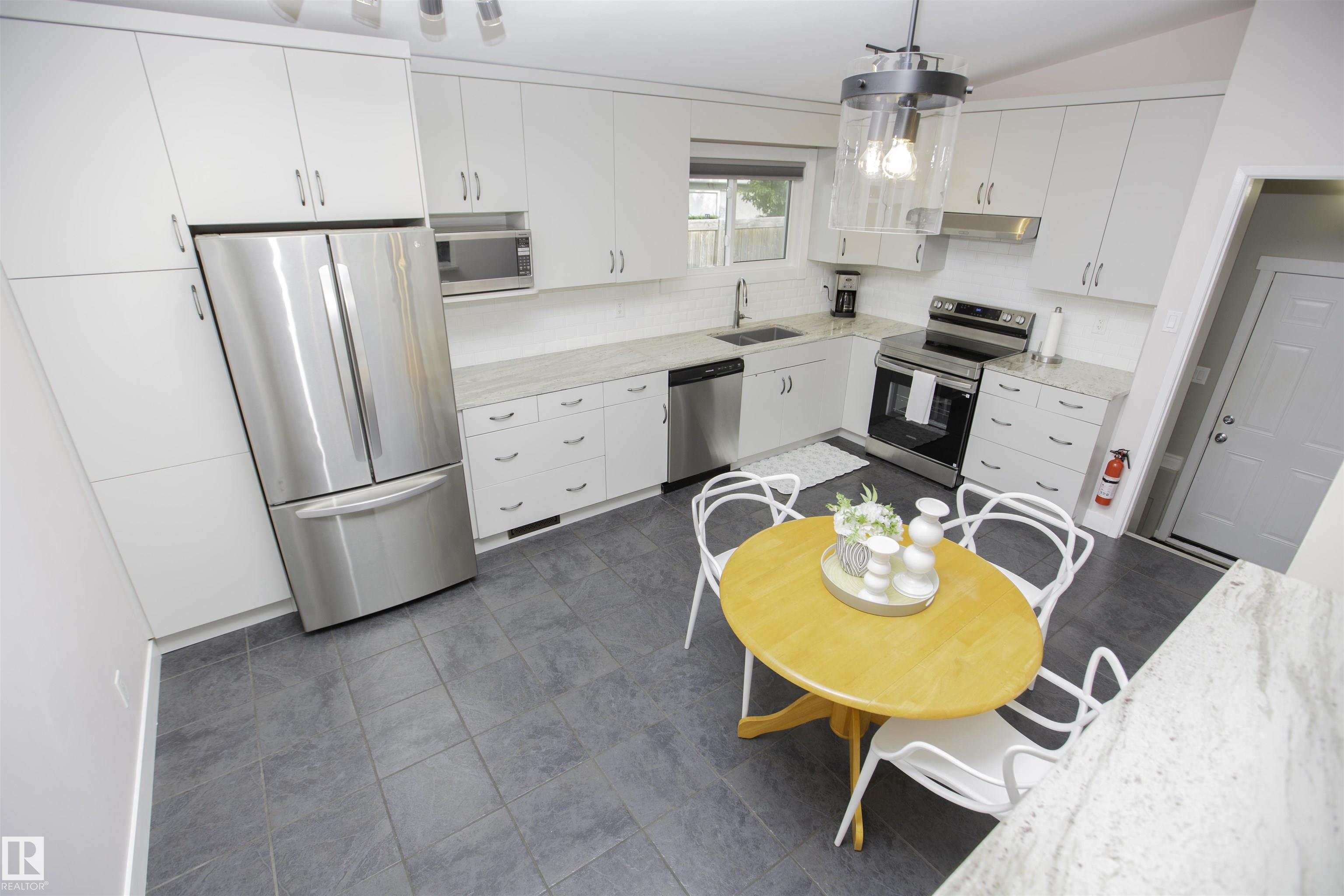 Photo 4 at 9107 58 Street NW, Ottewell, Edmonton