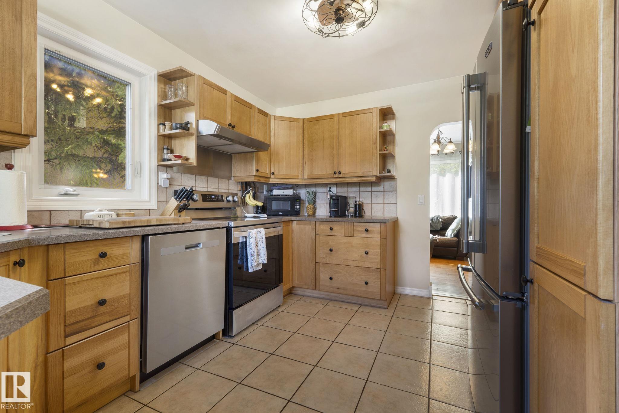 Photo 14 at 11331 60 Street NW, Highlands, Edmonton