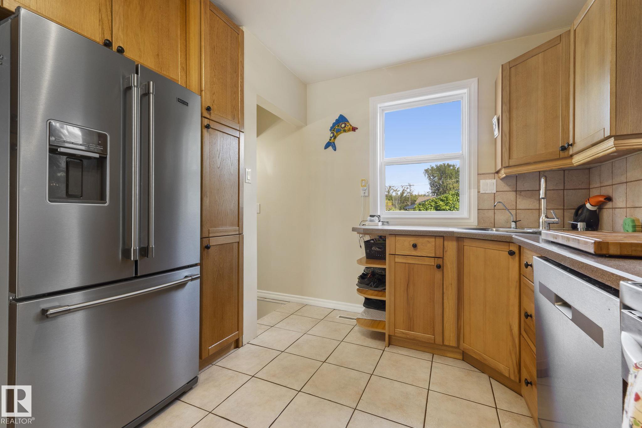Photo 16 at 11331 60 Street NW, Highlands, Edmonton