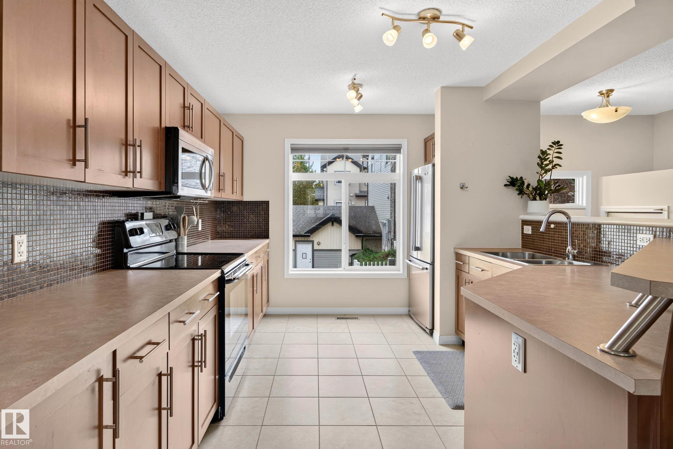 Photo 7 at 20 - 465 Hemingway Road NW, The Hamptons, Edmonton
