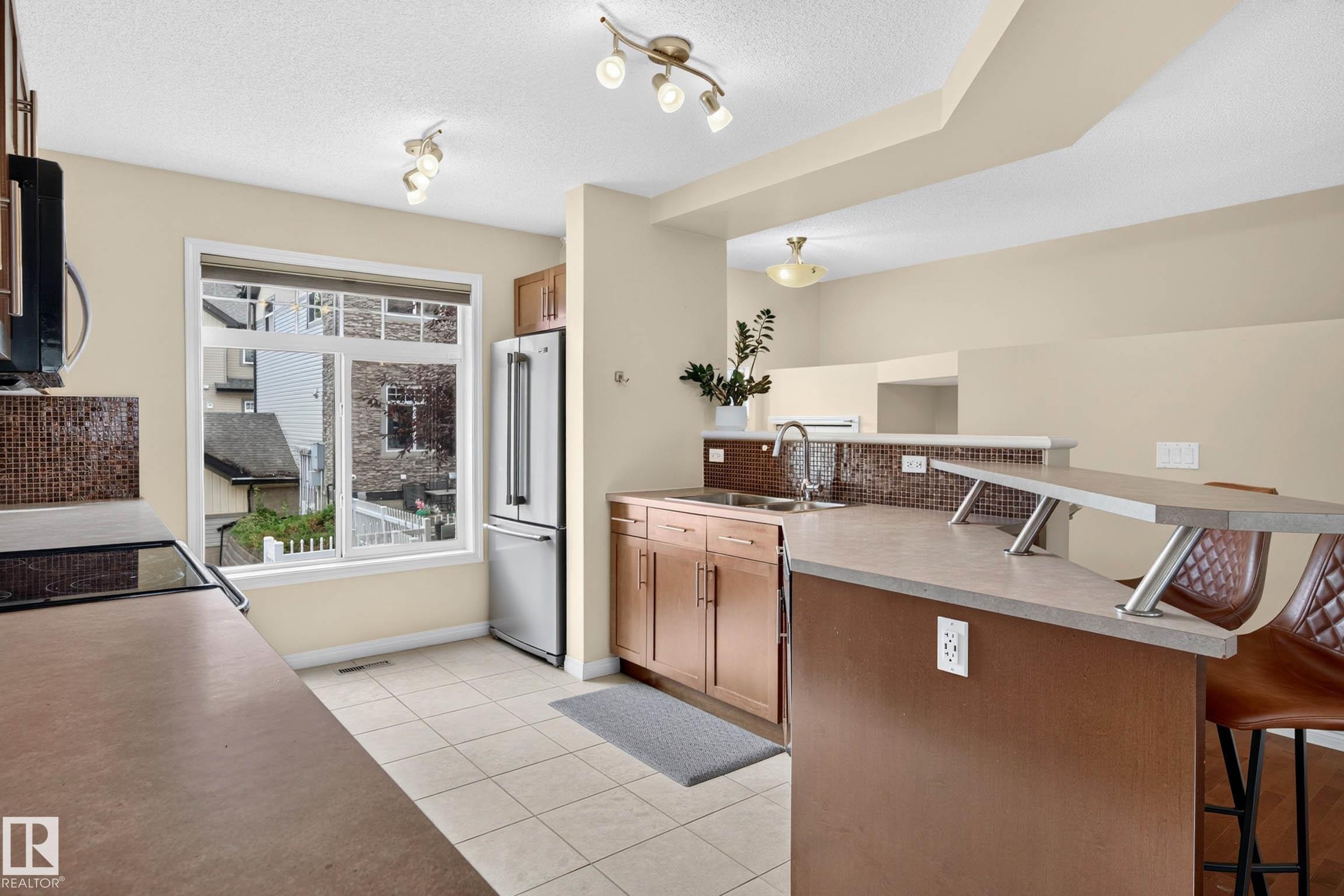Photo 8 at 20 - 465 Hemingway Road NW, The Hamptons, Edmonton