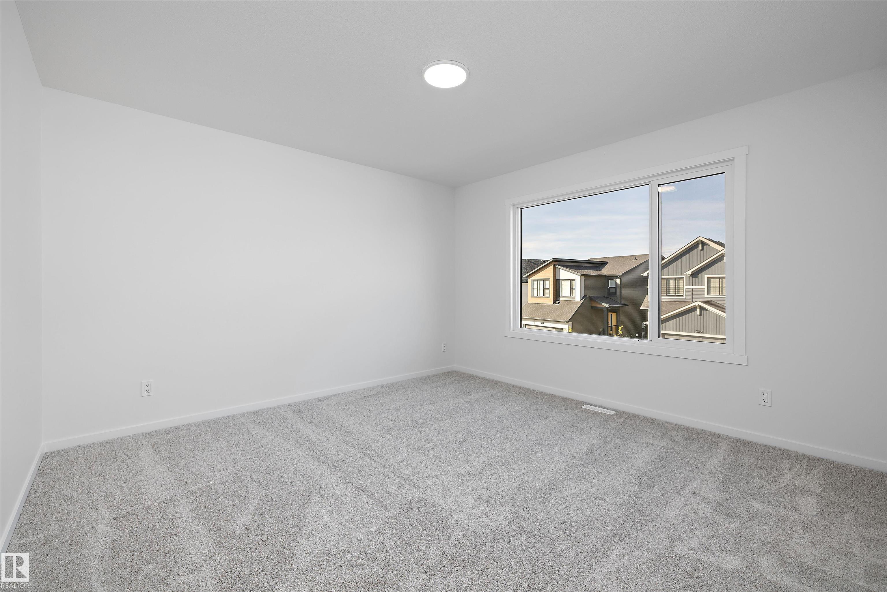 Photo 31 at 9103 Elves Loop NW, Edgemont, Edmonton