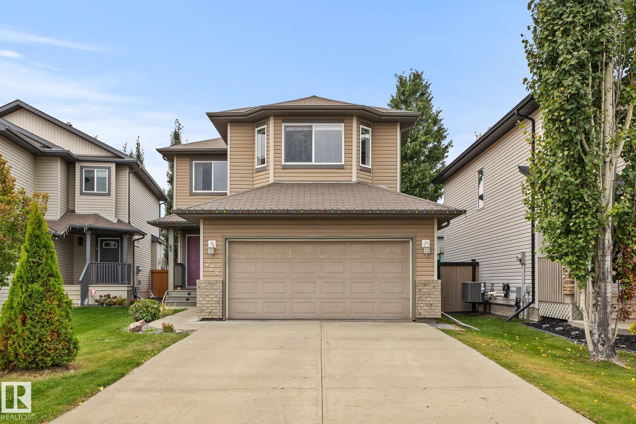 WELCOME HOME TO A QUIET CUL-DE-SAC IN FAMILY-FRIENDLY WINDERMERE. This fully finished 4-bedroom, 4-bathroom home has the space and layout that just works for family life. With nearly 1,850 sq ft above grade, the open main floor is warm and welcoming, with a spacious kitchen featuring new granite countertops, plenty of cabinetry and a corner pantry. Upstairs, the large bonus room is ready for cozy movie nights, along with 3 bedrooms including a generous primary suite with walk-in closet and ensuite with soaker tub. The finished basement gives everyone even more room with a 4th bedroom, full bathroom, rec room and dry bar, perfect for teenagers, guests or a home office. Central A/C keeps summer comfortable, while the composite deck is ready for BBQs and evenings outside. Close to parks, trails, playgrounds, schools, shopping and restaurants, this is a home where your family can settle in, spread out and make some really great memories.