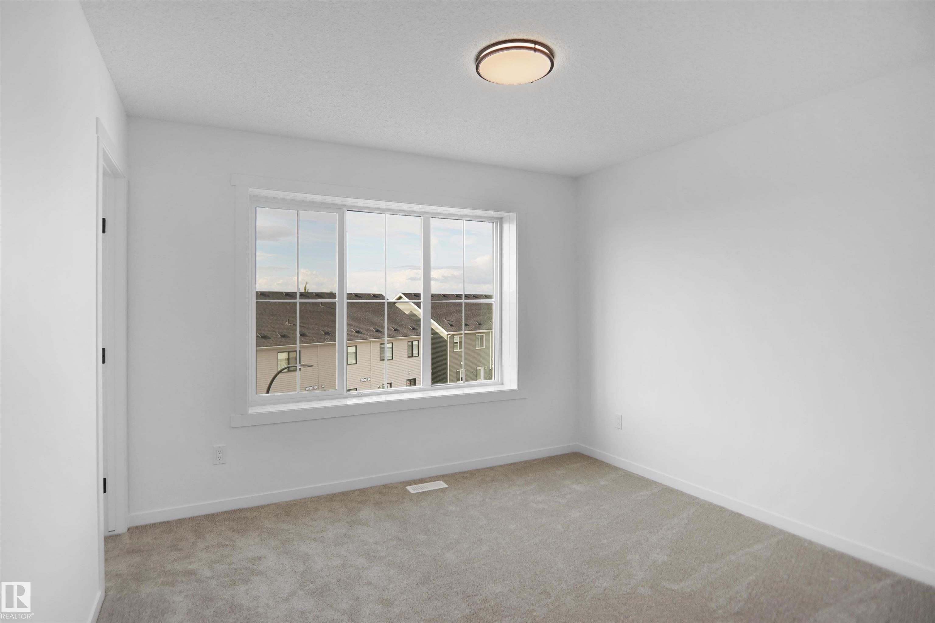 Photo 15 at 50 - 525 Secord Boulevard NW, Secord, Edmonton