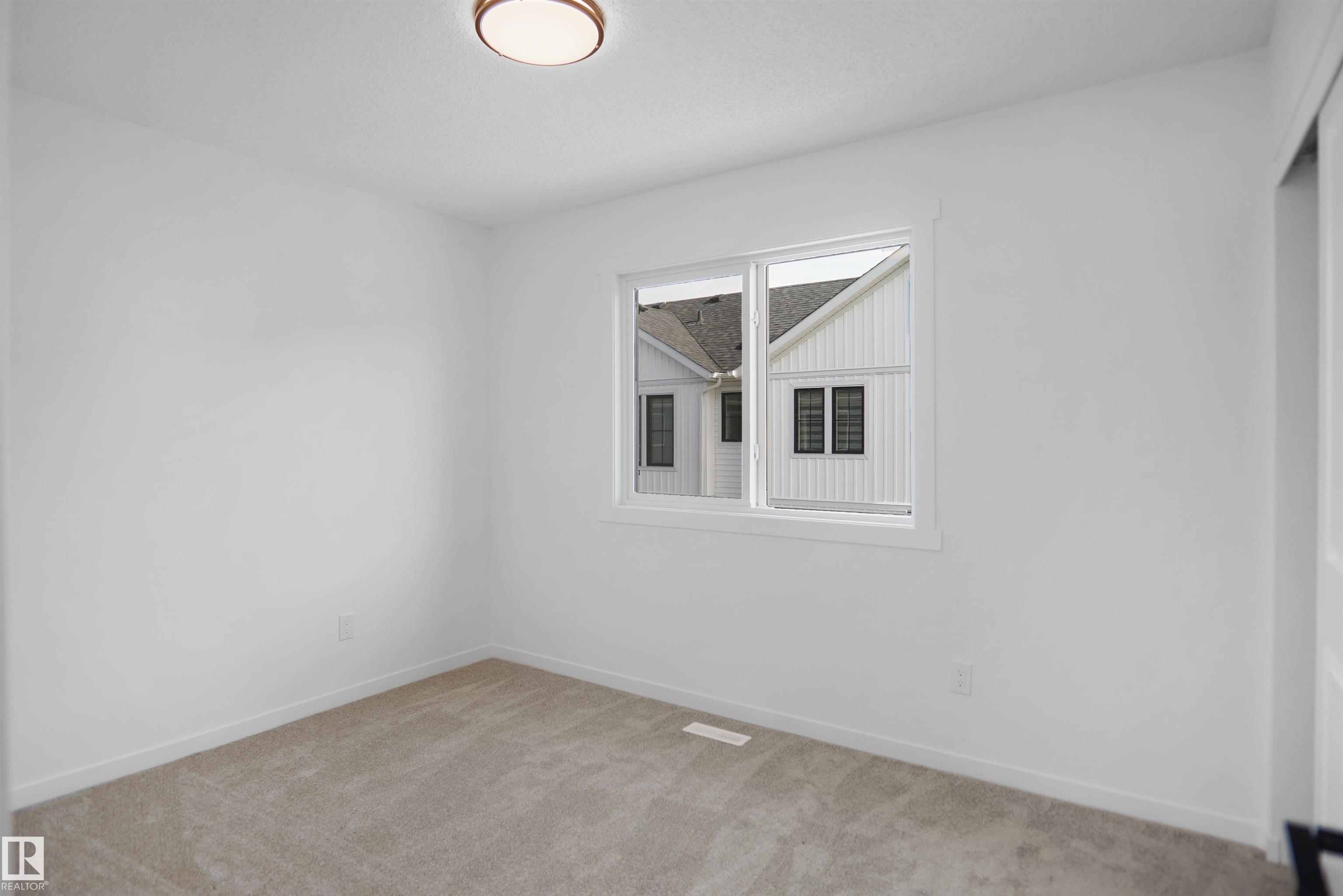 Photo 19 at 50 - 525 Secord Boulevard NW, Secord, Edmonton