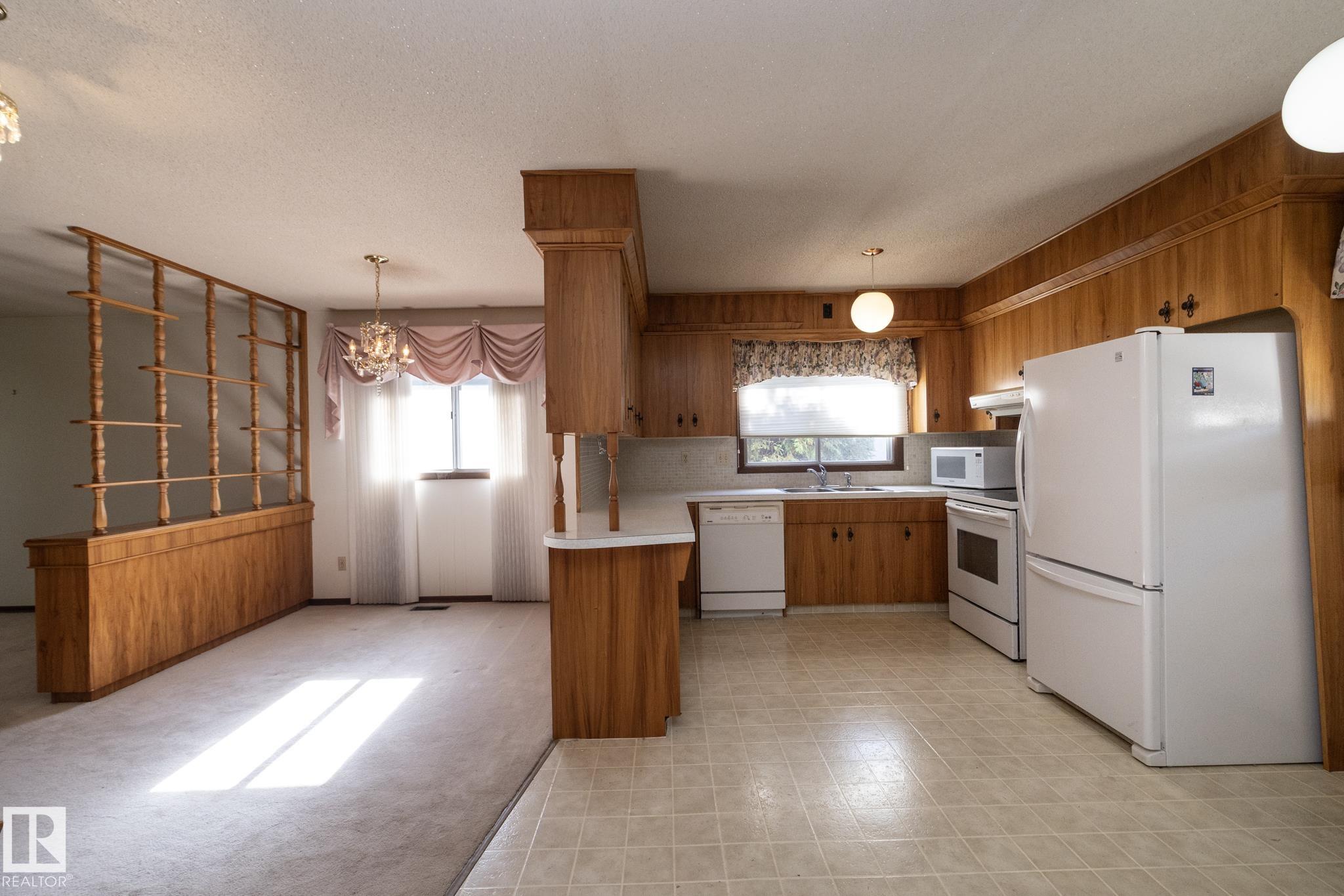 Photo 16 at 11322 52 Street NW, Highlands, Edmonton