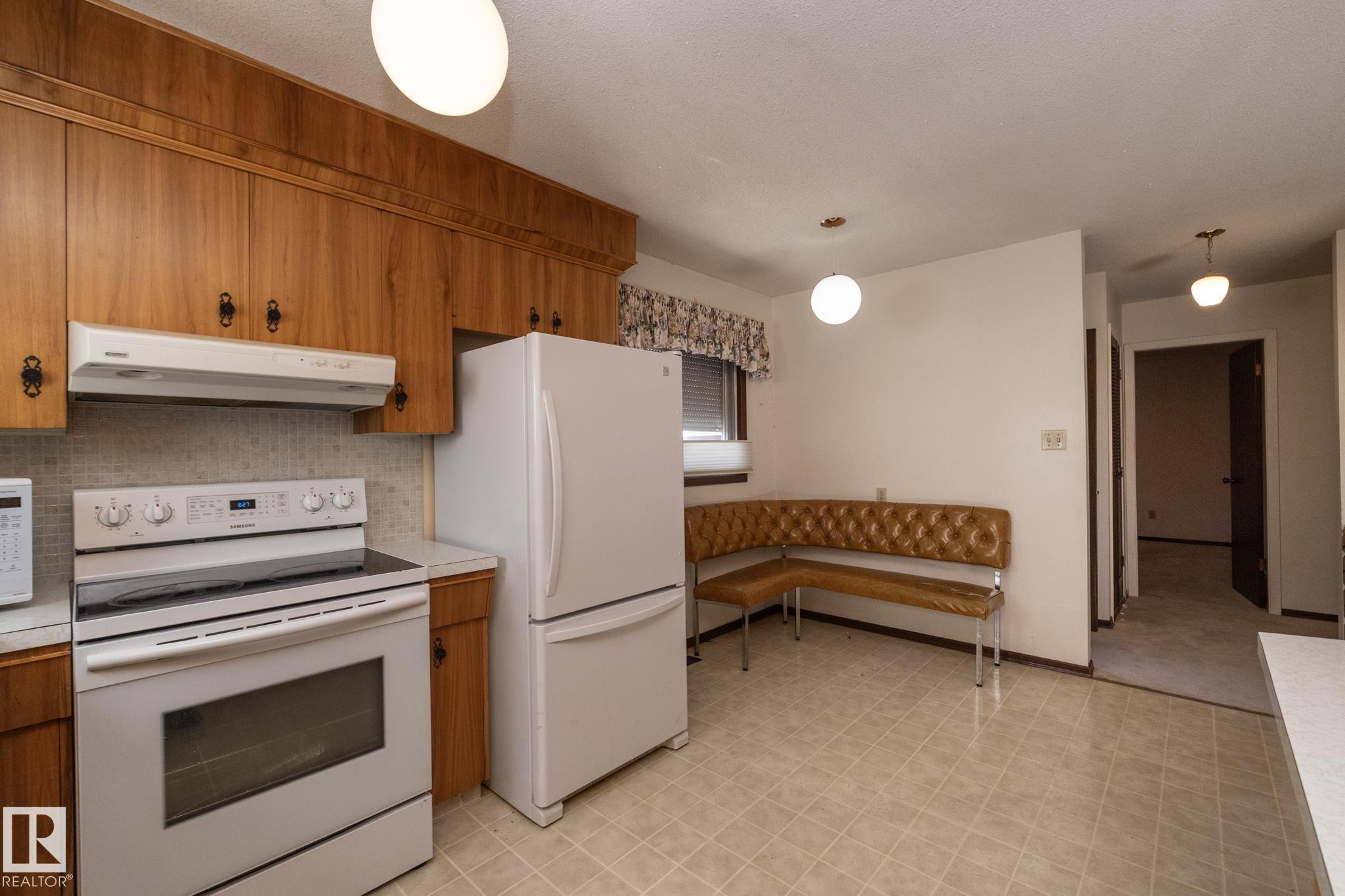 Photo 22 at 11322 52 Street NW, Highlands, Edmonton