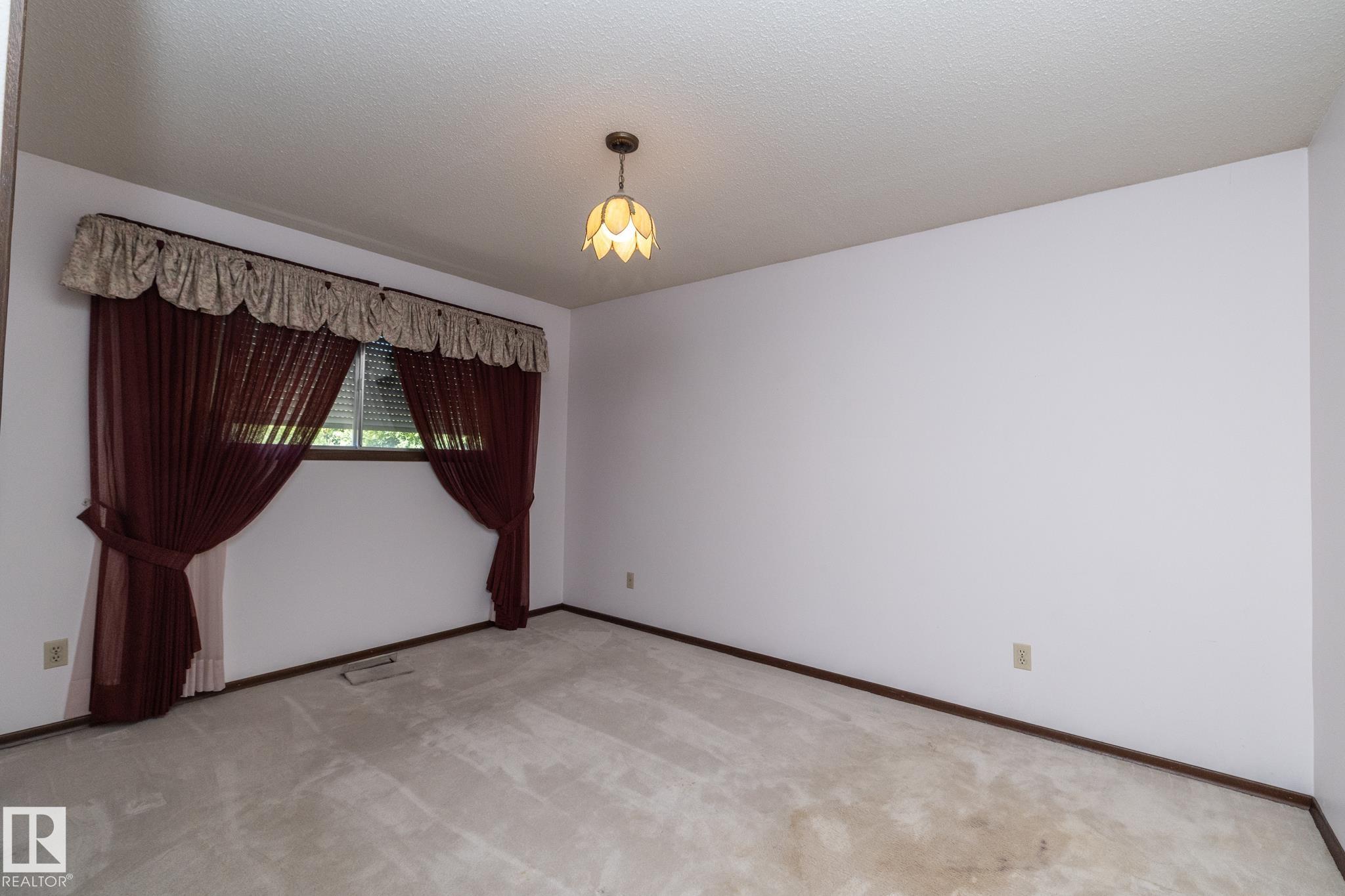 Photo 34 at 11322 52 Street NW, Highlands, Edmonton
