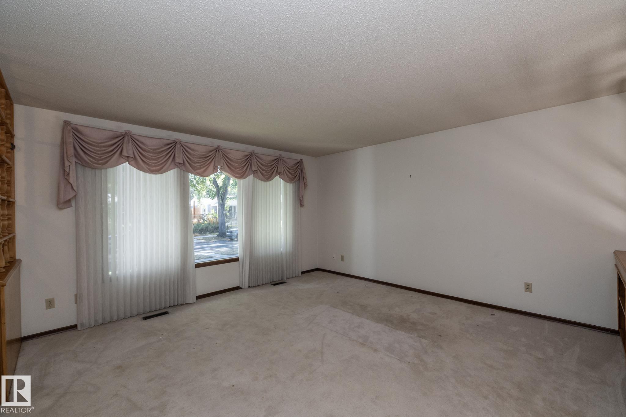 Photo 9 at 11322 52 Street NW, Highlands, Edmonton