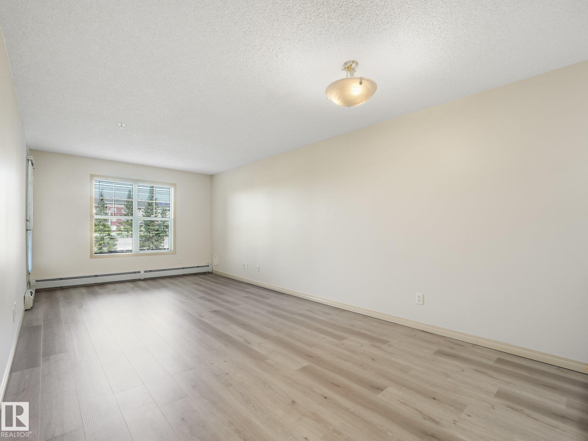 Photo 11 at 214 - 11445 Ellerslie Road SW, Rutherford, Edmonton