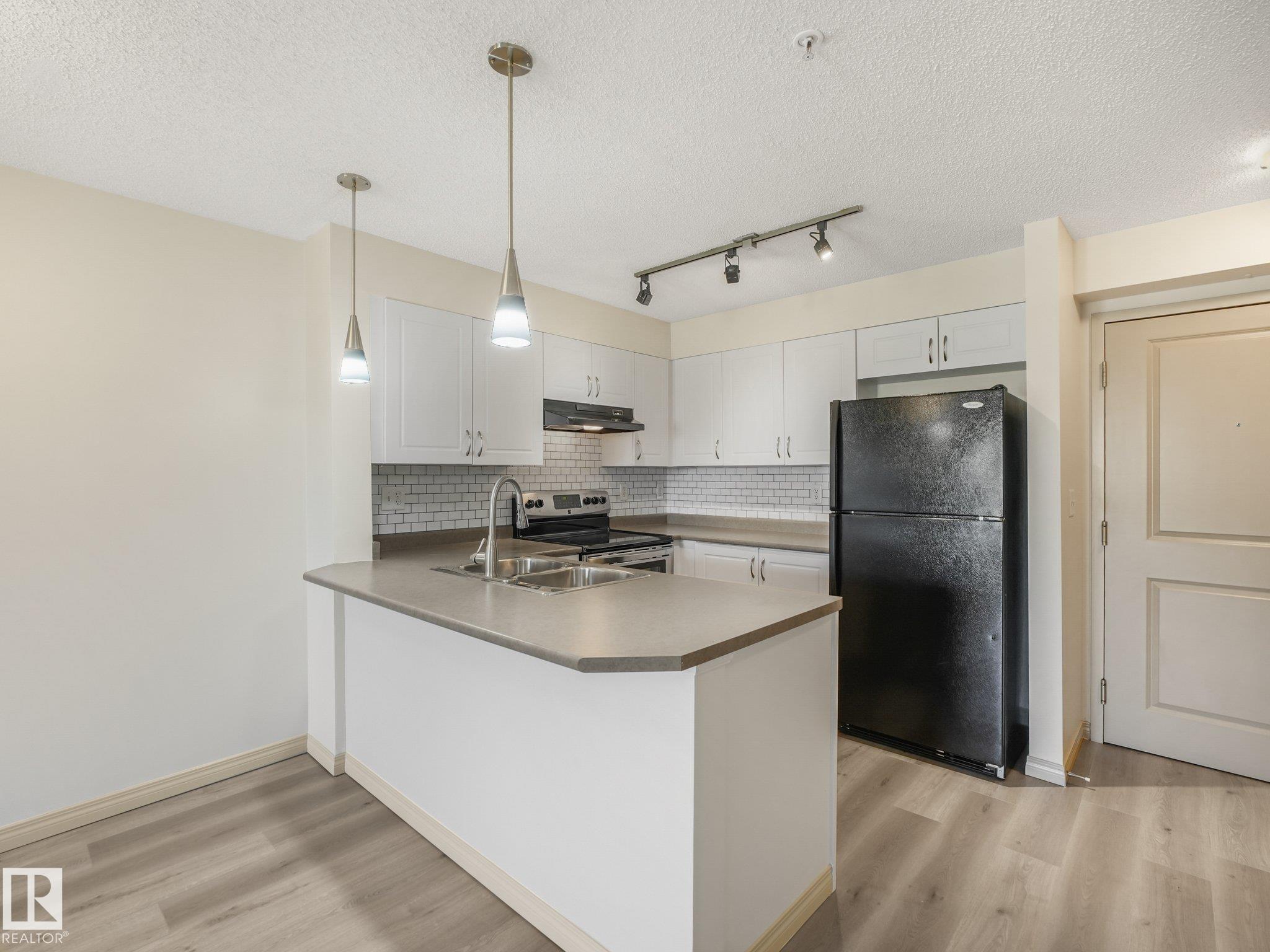 Photo 16 at 214 - 11445 Ellerslie Road SW, Rutherford, Edmonton