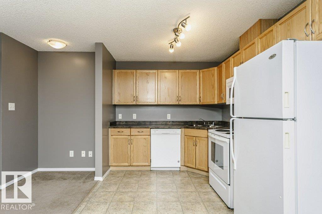 Photo 12 at 308 - 309 Clareview Station Drive NW, Clareview Town Centre, Edmonton
