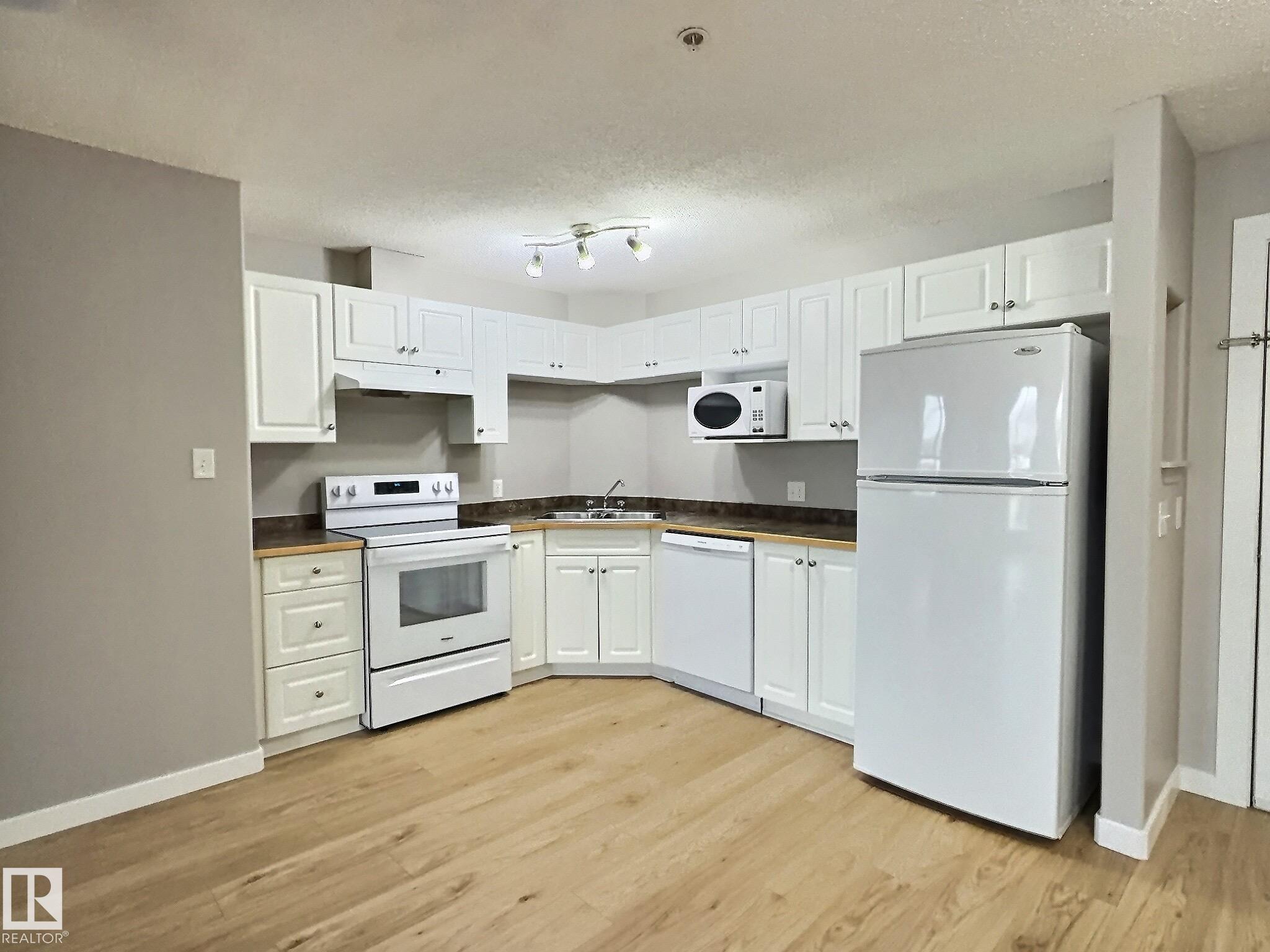 Photo 6 at 103 - 5350 199 Street NW, The Hamptons, Edmonton