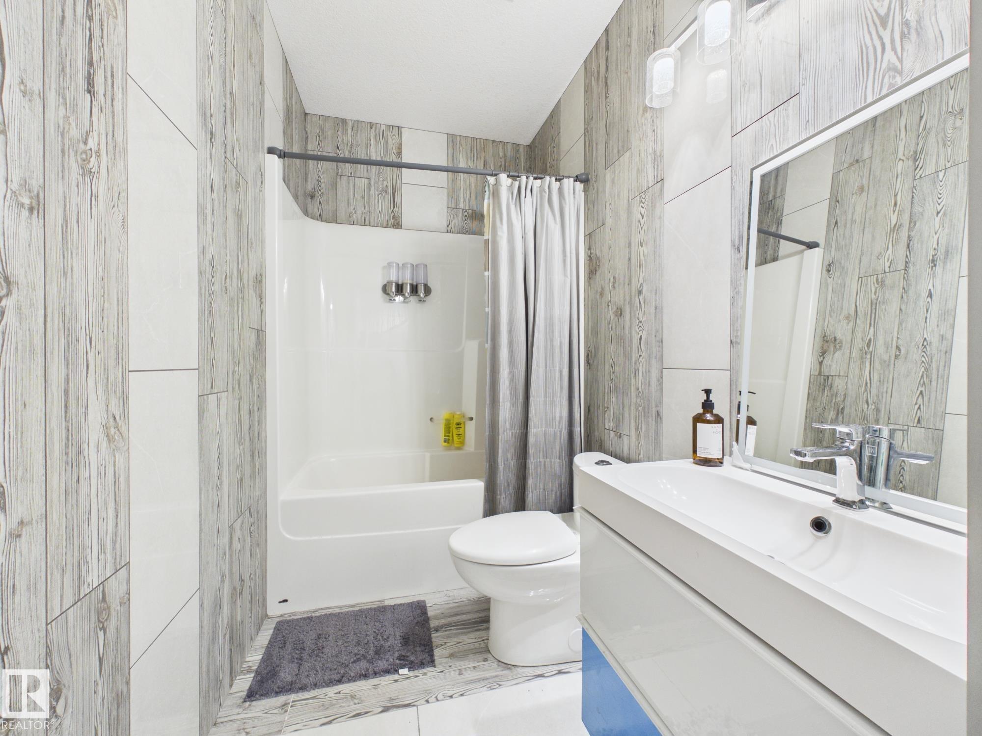 Photo 43 at 14815 16 Street NW, Fraser, Edmonton