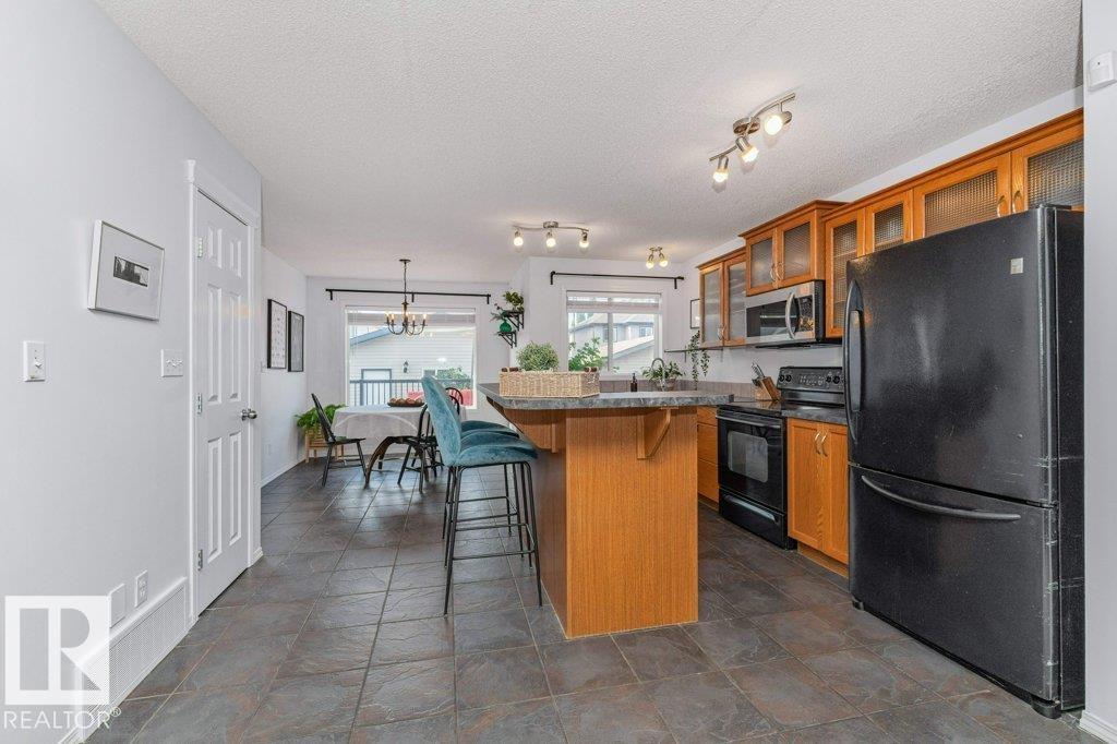 Photo 8 at 12059 19 Avenue SW, Rutherford, Edmonton