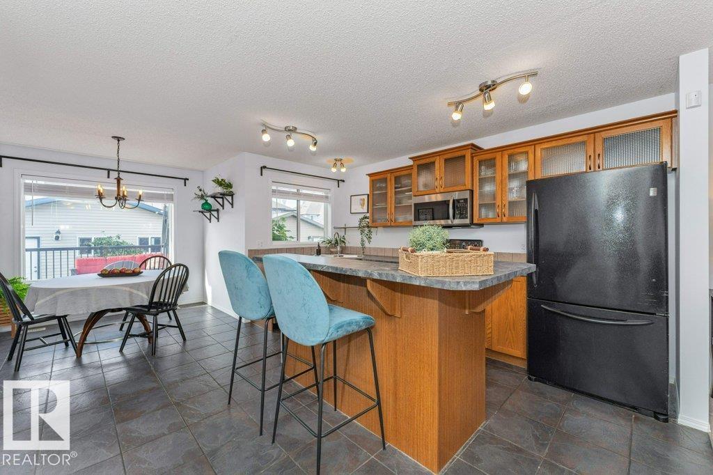Photo 9 at 12059 19 Avenue SW, Rutherford, Edmonton