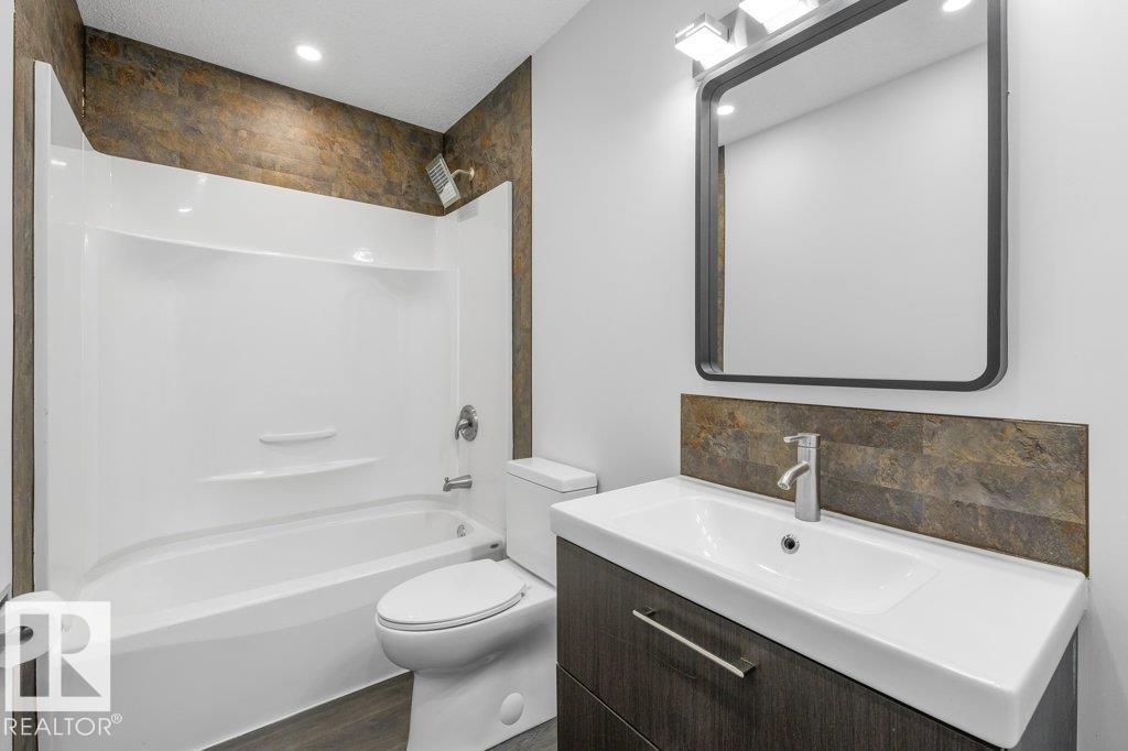 Photo 16 at 2311 146 Avenue NW, Fraser, Edmonton