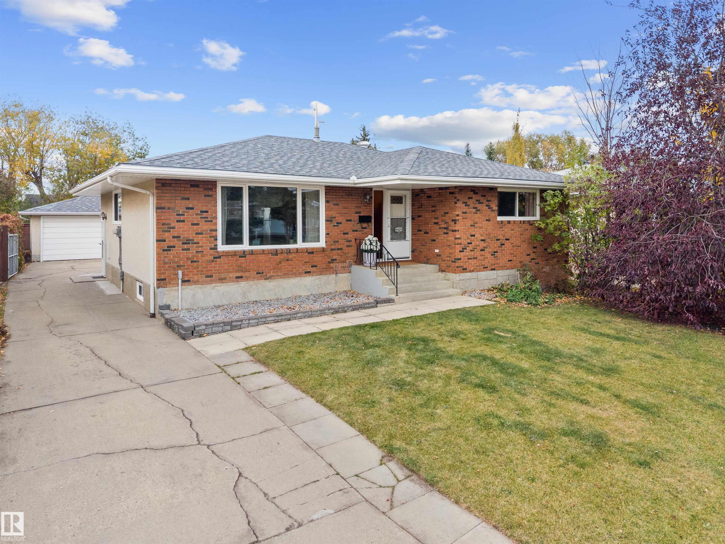 What if your next home could give you the space your family needs, while helping pay your mortgage? Welcome to this opportunity in Duggan! Imagine room for everyone with 6 generously sized bedrooms, 3 bathrooms, 2 kitchens, 2 living rooms and 2 separate laundry areas! The main floor offers 3 spacious bedrooms and comfortable living spaces, while the fully developed LEGAL BASEMENT SUITE WITH ITS OWN PRIVATE SIDE ENTRANCE opens the door to so many possibilities! Perfect for extended family, rental income or having extra space to call your own. Fresh paint and new vinyl flooring in the basement make this home move-in ready, while the large lot and oversized double garage offer plenty of room for parking, storage and outdoor enjoyment. And with parks and schools just a short walk away, the location is another reason to fall in love! With flexible living options, income potential and a fantastic location in an established neighbourhood, this is a home that offers more than just space. It's an opportunity!