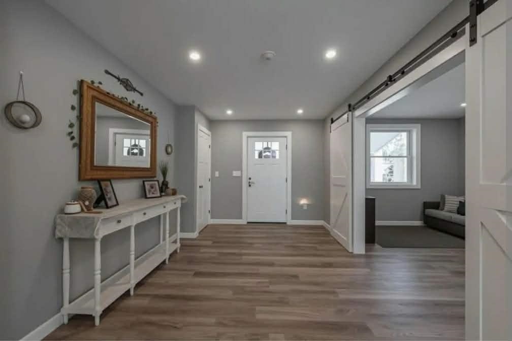 This front door off the farmers porch even has a play room off the entry