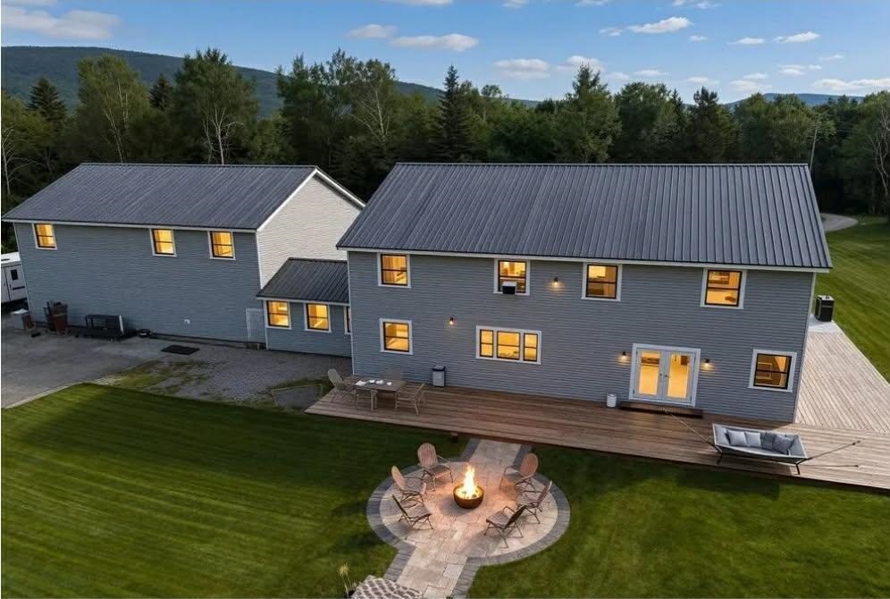 Stone patio featuring a fire pit right off the kitchen/living room