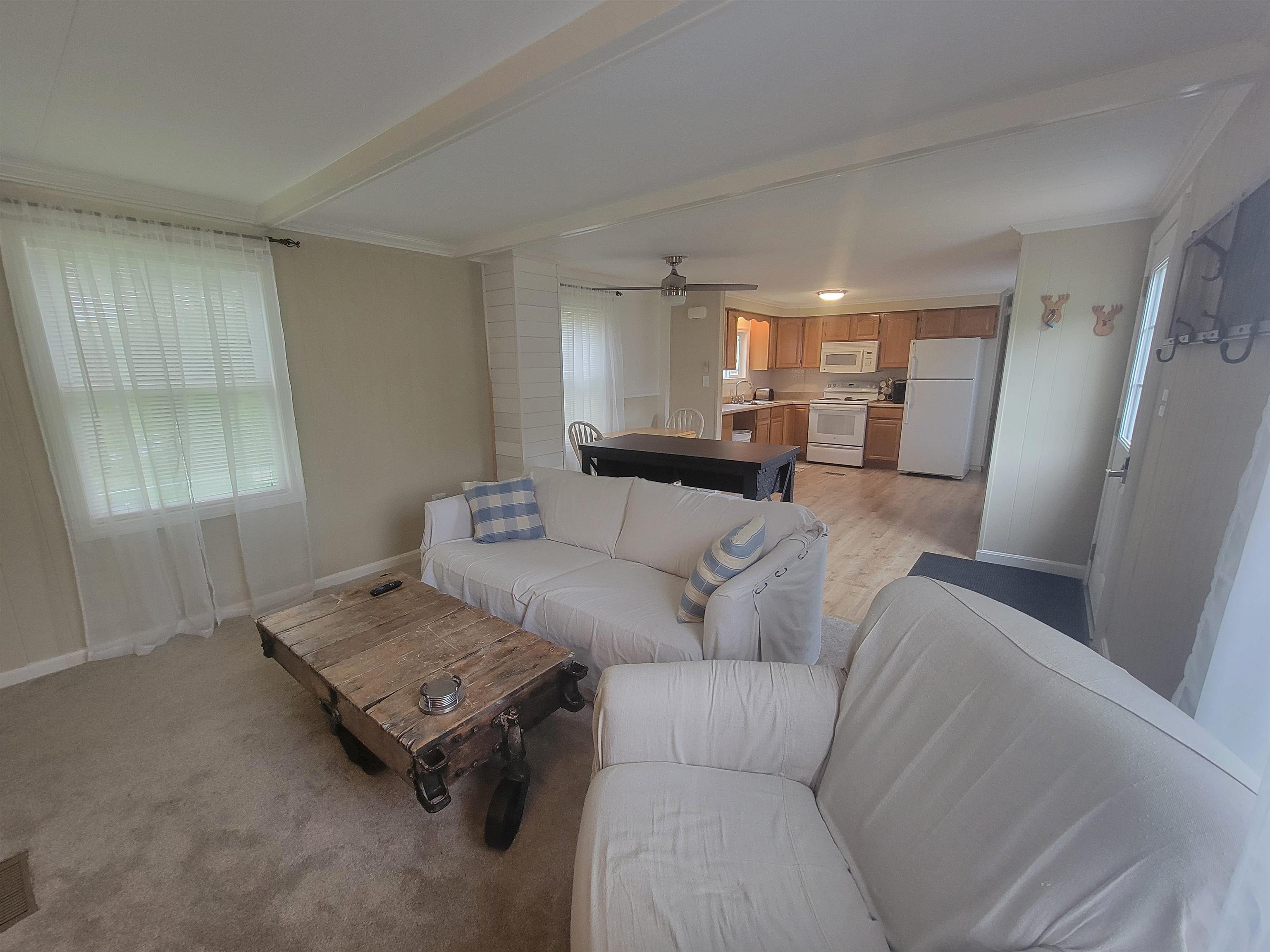 Comfortable living room with newer carpet