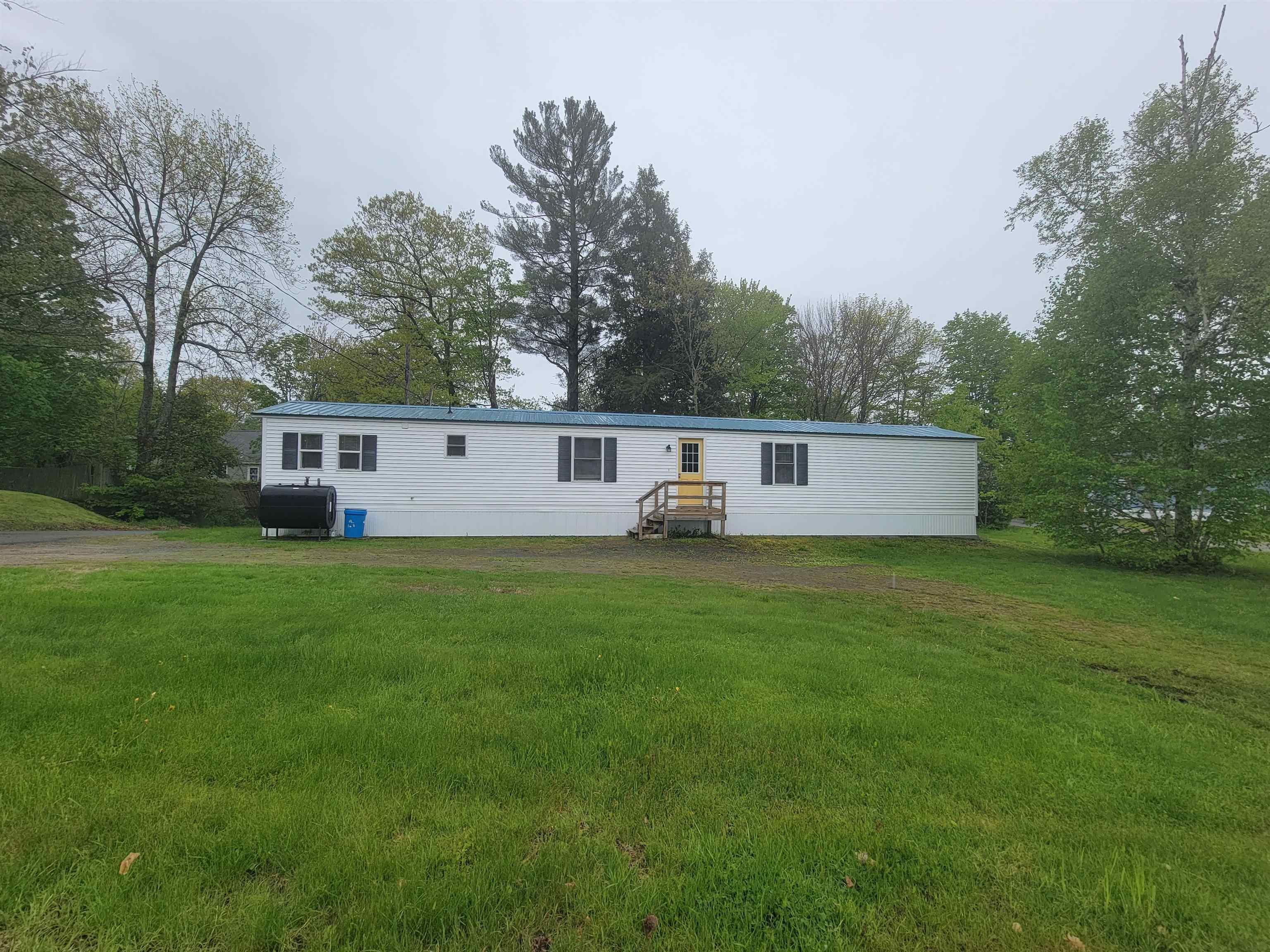 Exterior upgrades include freshly painted doors
