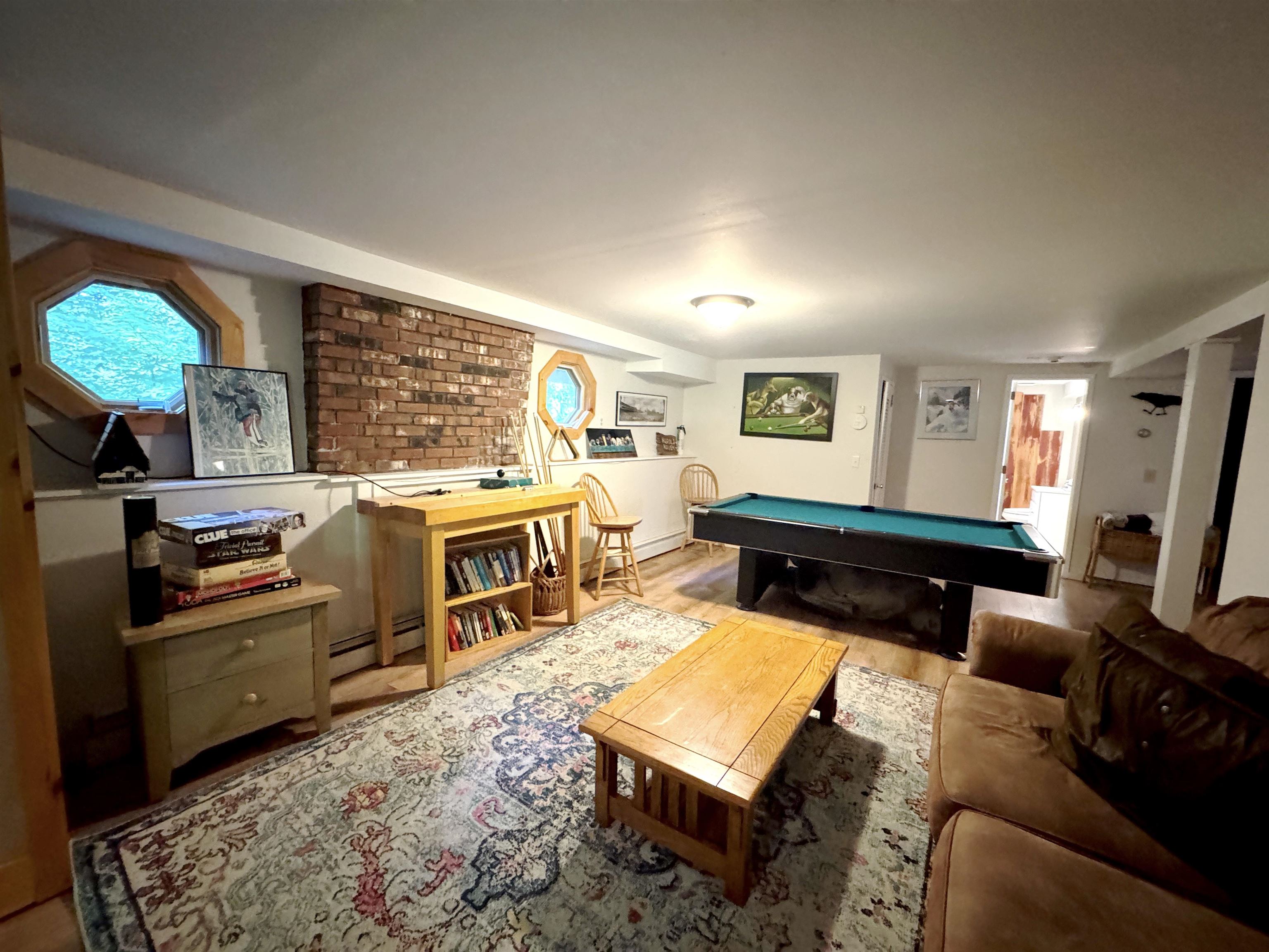 Enjoy a game of pool or board games on the cozy lower level
