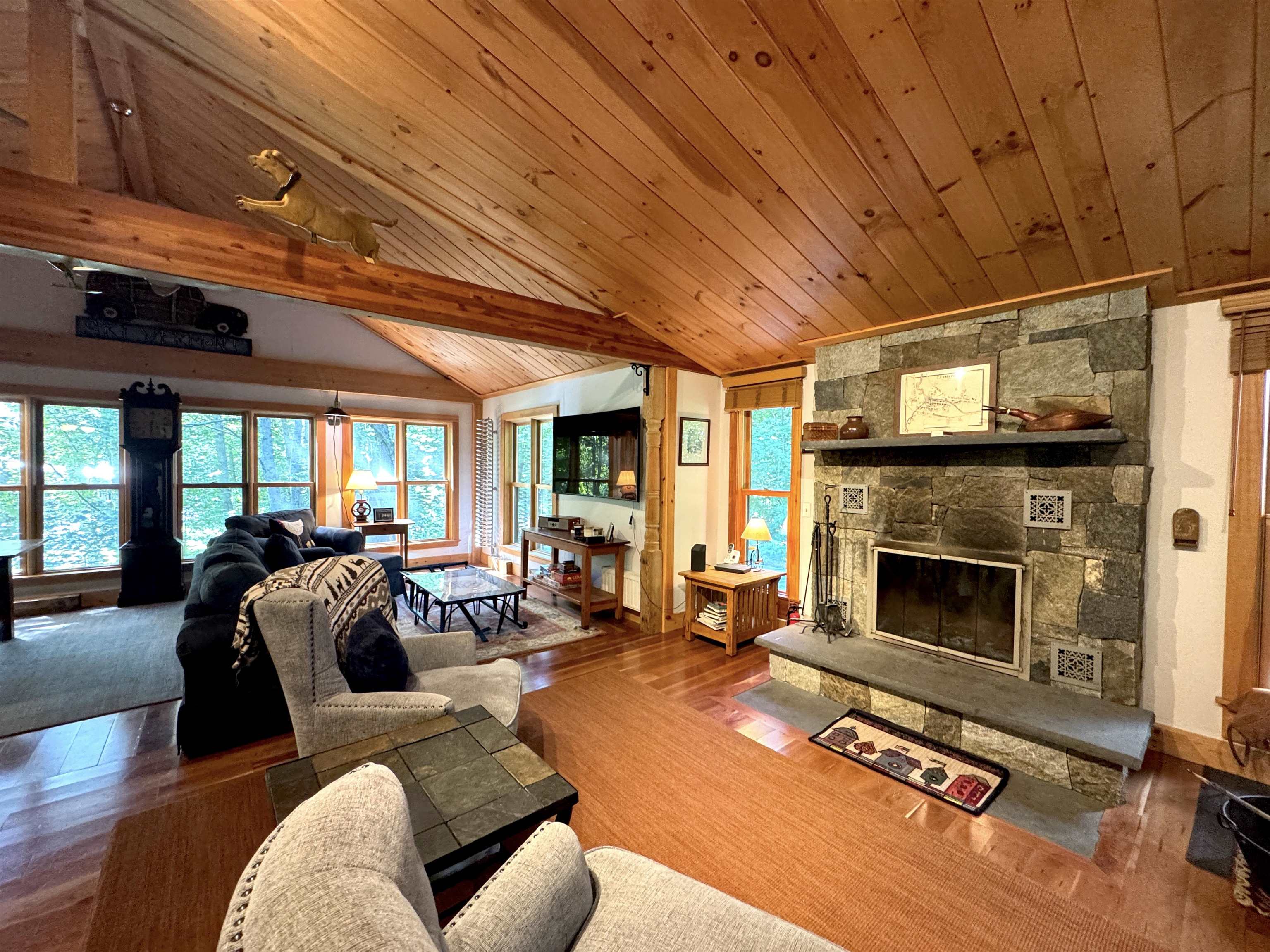 Warm up by the stone fireplace after a cold day