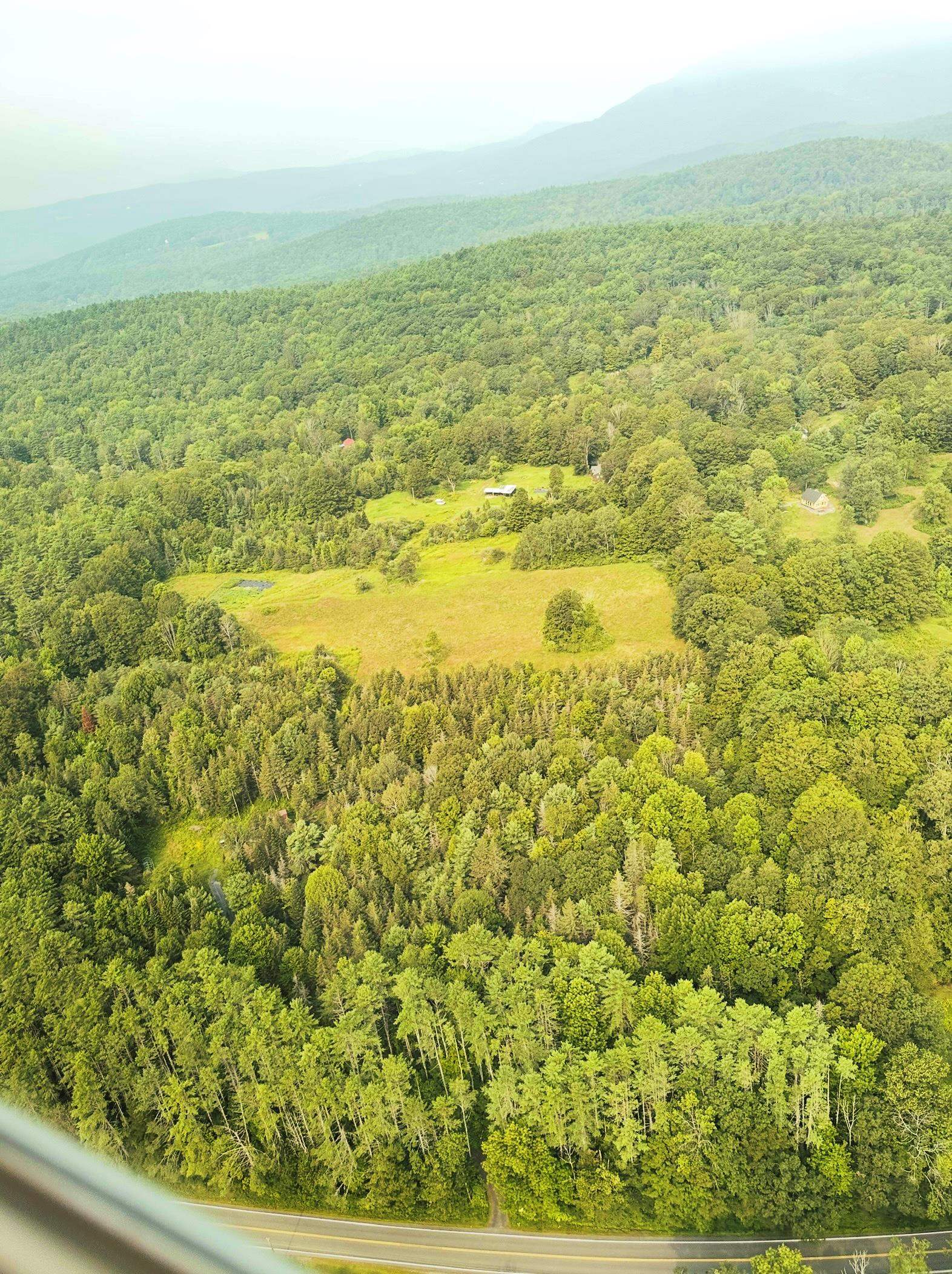 driveway is in the center bottom of this picture 24013792