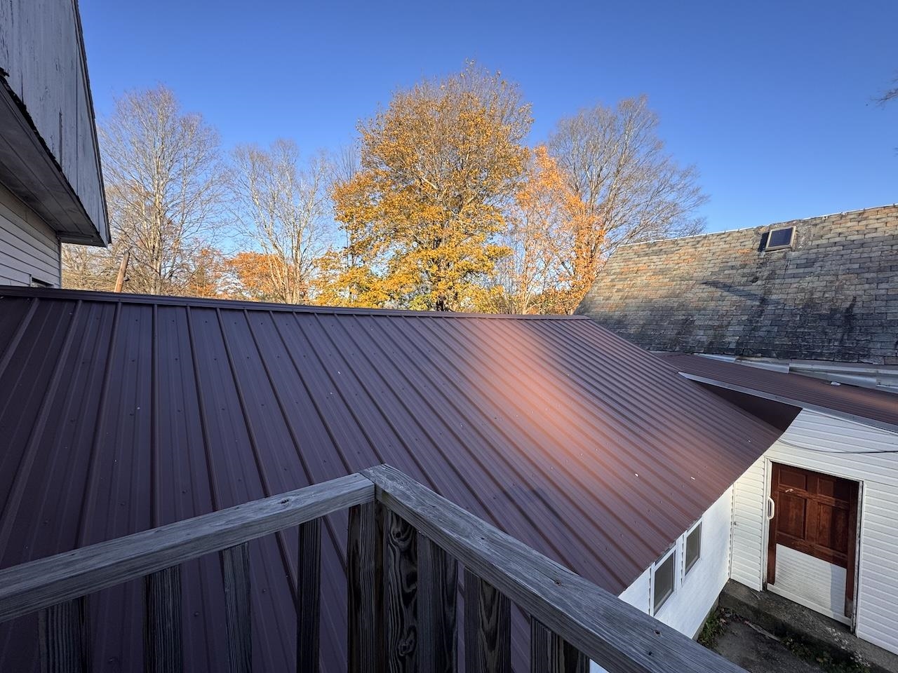 Metal Roof On Storage and Slate On The House
