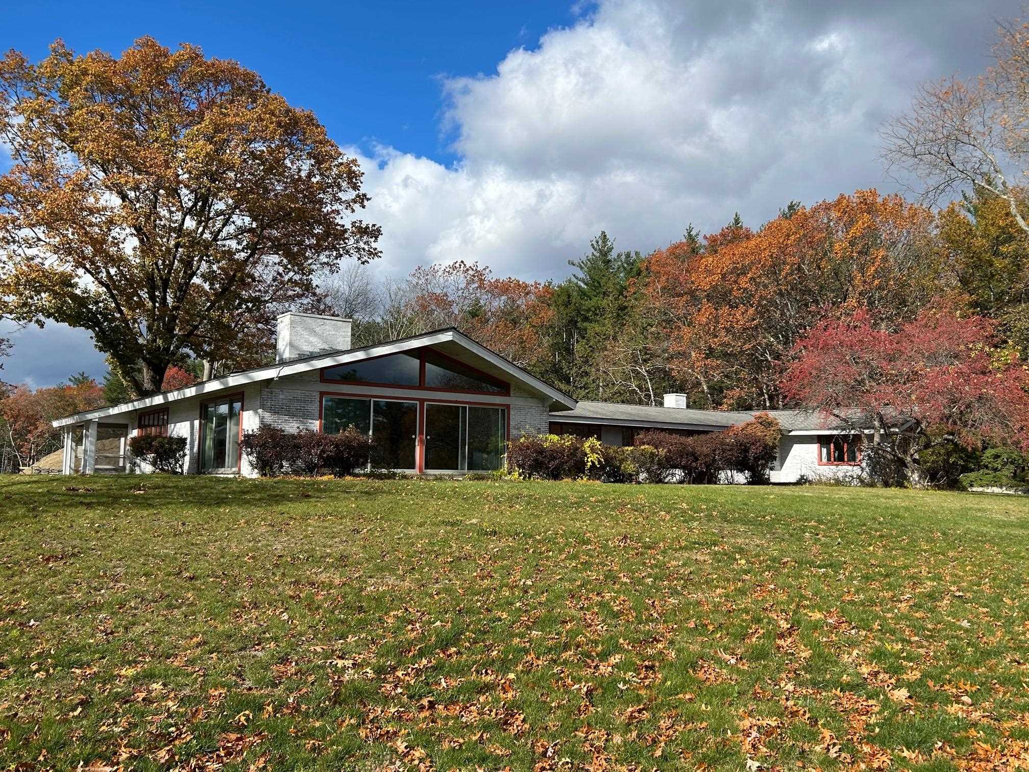 Bring this Classic Mid-Century Modern Ranch back to its former glory!  The 2 acre lot abuts Greeley Park and is nestled into the heart of Nashua's iconic North End.  This captivating home boasts 3991 sq. ft. on one level and an additional 3000+ sq. ft. in the lower level for future finish.  The ample garage space (5 cars total), kitchenette and open floor plan could easily accommodate multi-generational living.  Exterior amenities include and inground pool, inground hot tub, and tennis court (the current owner has not occupied the property and does not know the condition of the these exterior features).  The property is being sold in "as-is" condition.  Accompanied showings only.