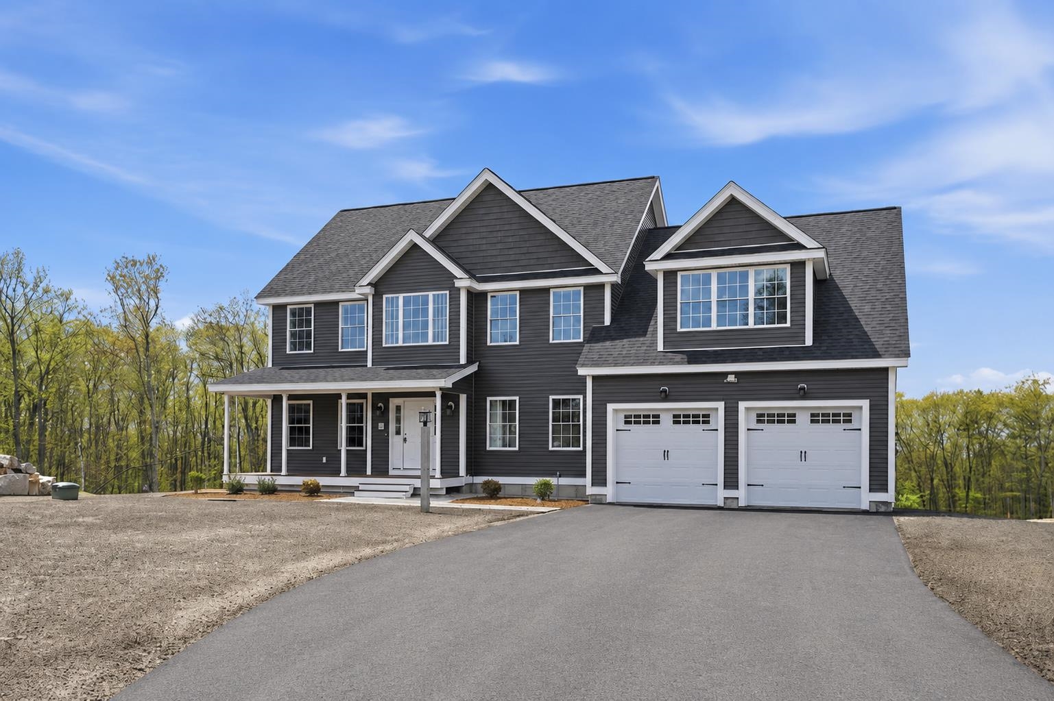 Welcome to Denali Estates, Derry’s most desirable new Luxury neighborhood tucked away in a beautiful rural setting with views yet close to all area amenities! This stunning 4 BR Hess Colonial offers the perfect blend of comfort, style, and functionality on a spacious 1+ acre Lot. Step inside to find a thoughtfully designed floor plan with 9’ Ceilings and abundant natural light throughout. The 1st floor features a private office, dining Room, living Room and a spacious family room with a cozy gas fireplace. The large chef’s kitchen will impress with a walk-in pantry, island and a slider leading to the rear deck, perfect for entertaining or relaxing. Upstairs, retreat to the luxurious primary suite complete with a walk-in closet and spa-like bath featuring a tiled shower, soaking tub, and double vanity. 3 additional bedrooms, a full bath, and second-floor laundry complete this ideal layout. Future expansion is possible in the walkout basement with high ceilings, windows and another slider. All set on a prime lot just minutes from I-93, shopping, dining, the Derry Rail Trail, and several local lakes. Still time to select your cabinets and flooring. Customize your finishing touches and experience the craftsmanship and lifestyle Denali Estates is known for plus the sought After Derry/Pinkerton Schools!