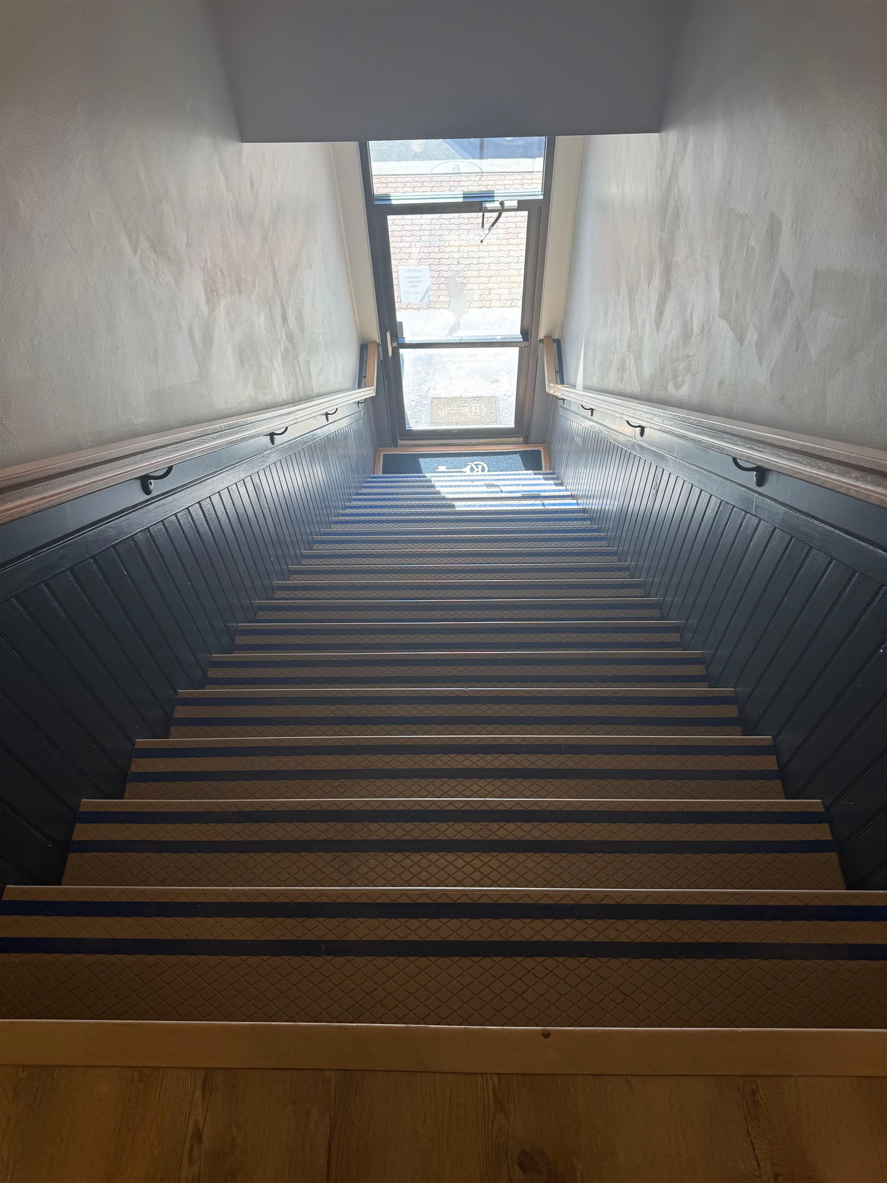 Stairs up to 2nd floor from Main St 24438837