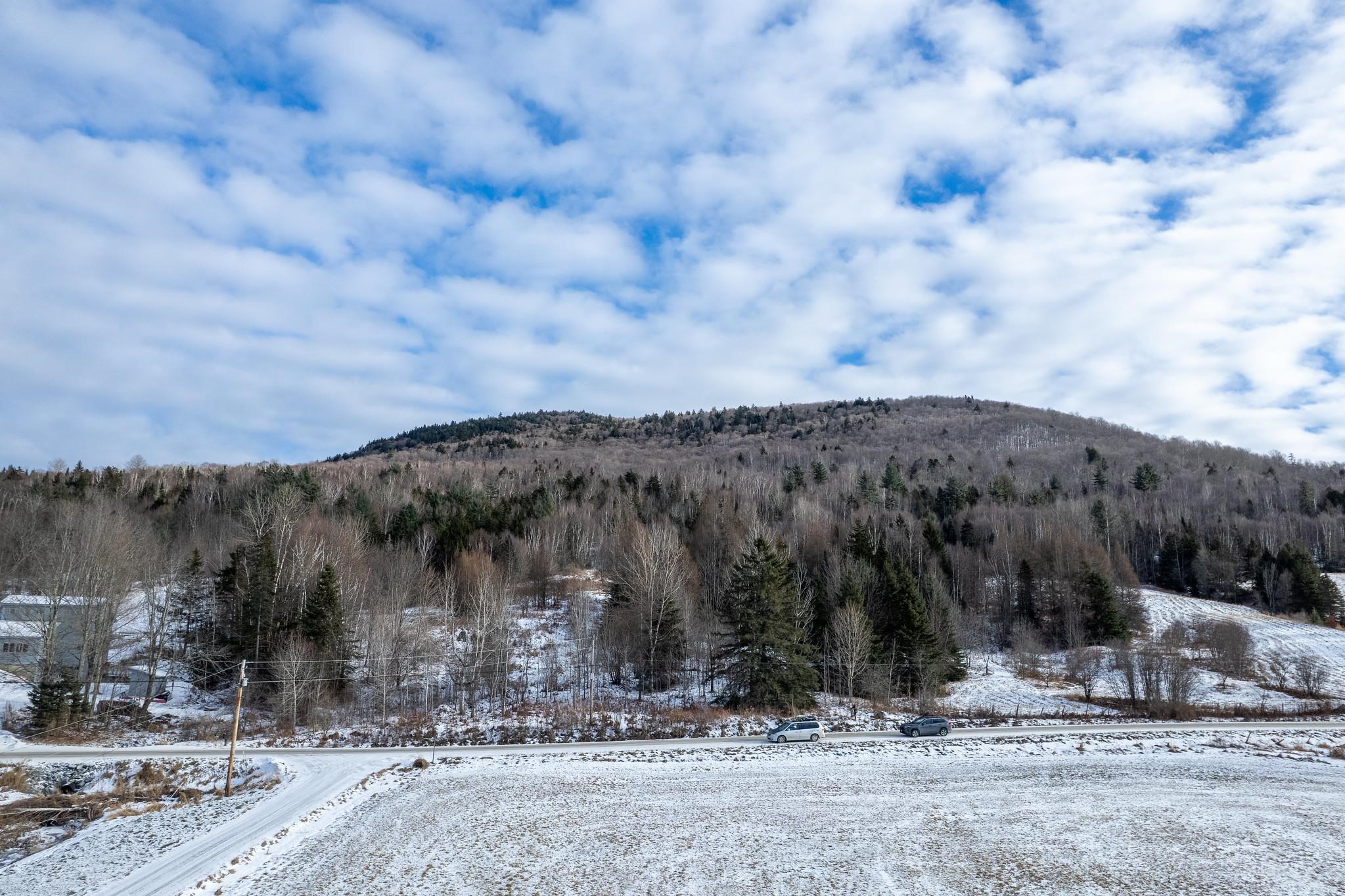 land rises from the road