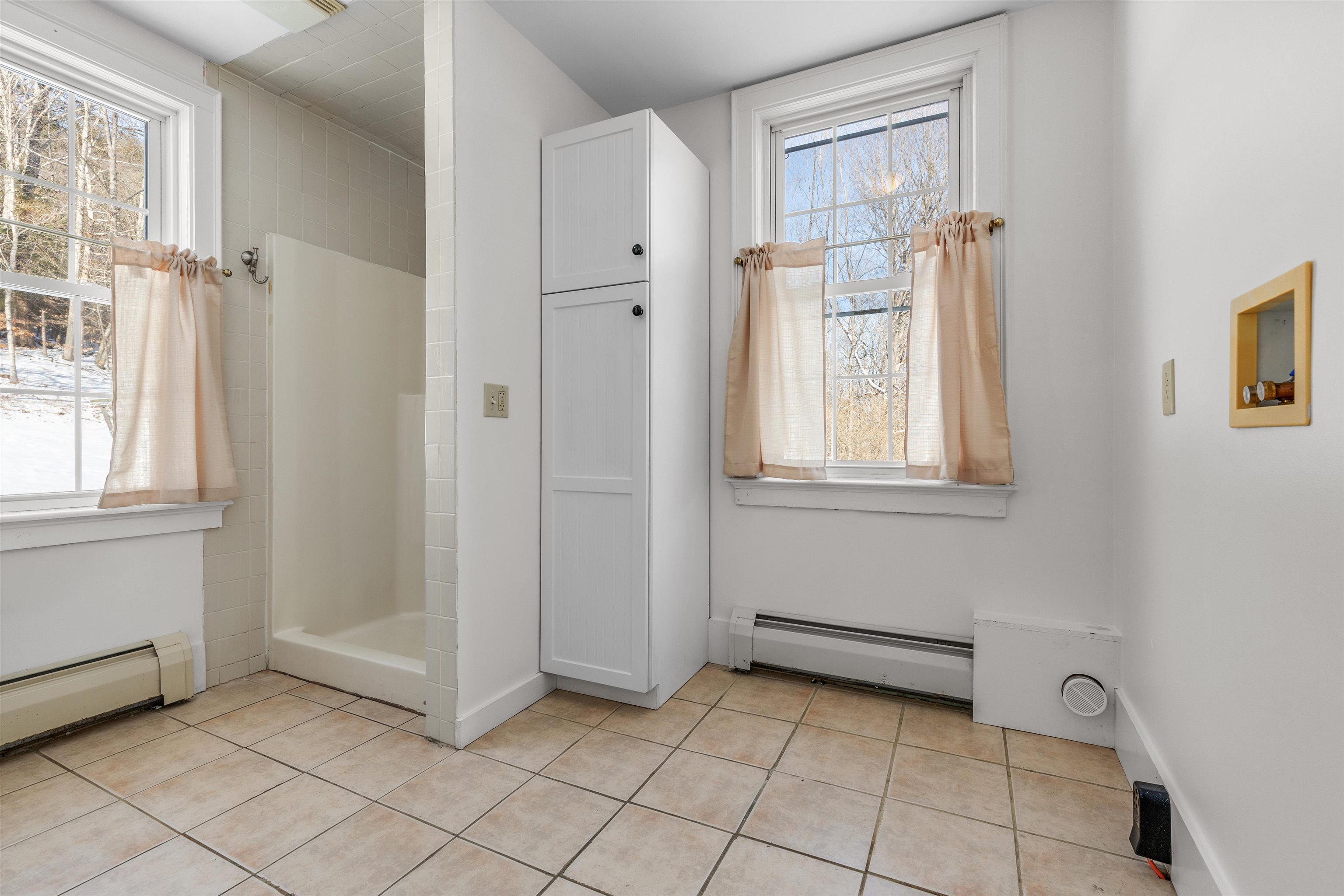 Two doors into primary bath--one off bedroom and one off living room 24639667