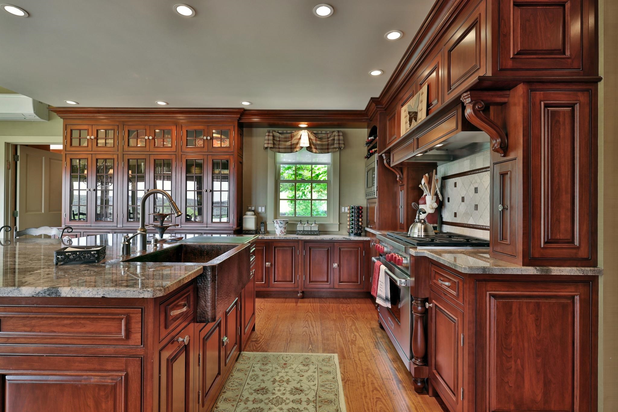 Custom built cabinetry and updated counters and appliances