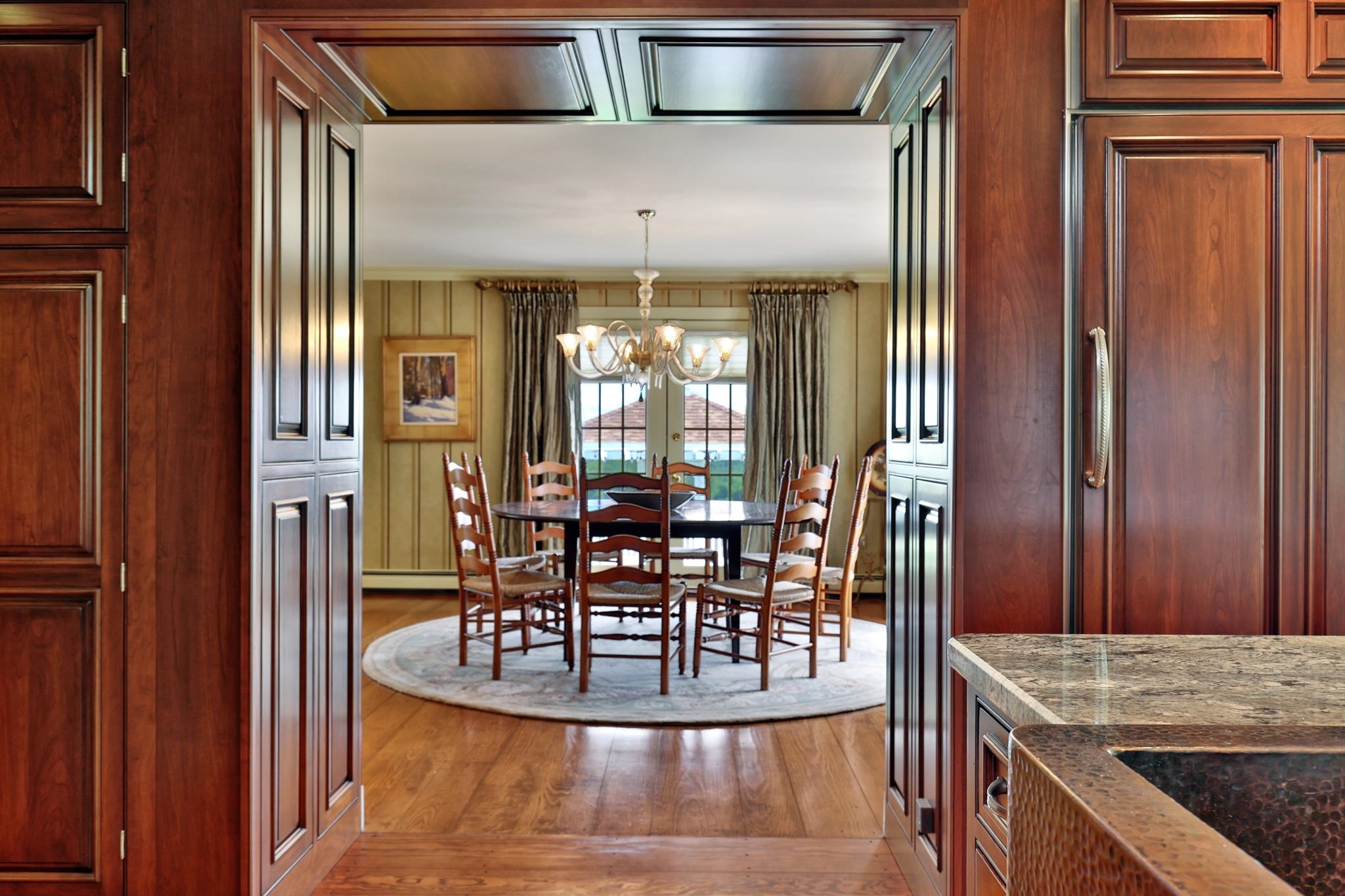 Separate dining room with access to outdoor spaces