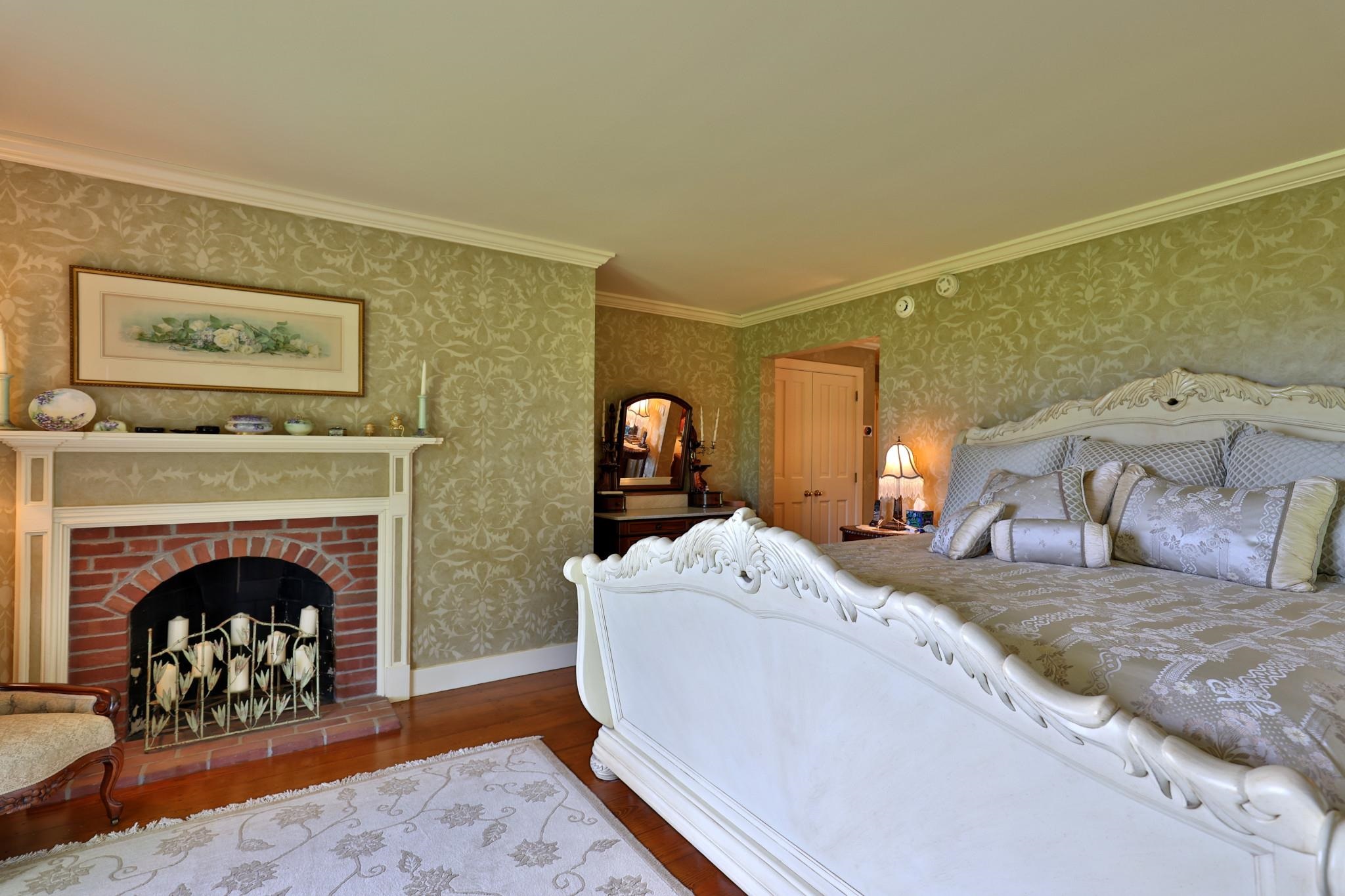 Primary bedroom suite with updated bath