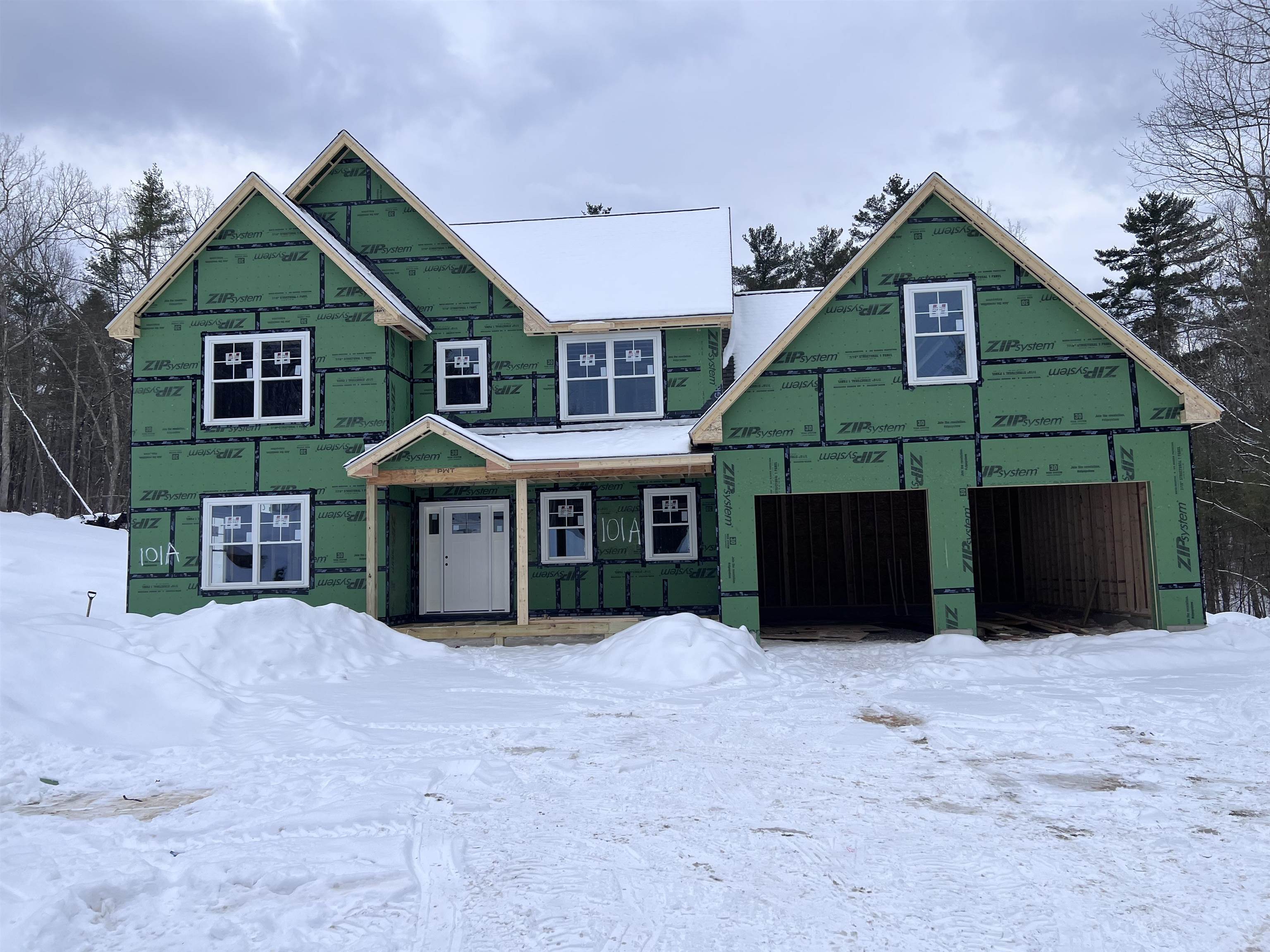 Under Construction in Merrimack, NH. This thoughtfully designed 3,455± square-foot new construction home is situated on a ±3.8 acre lot and offers a spacious layout with a bright, open, and welcoming feel. The main level features 9-foot ceilings, a foyer, a functional mudroom, and a first-floor study or home office, ideal for today’s flexible lifestyles. The open-concept kitchen, living, and dining areas flow seamlessly and are highlighted by a great room with a vaulted ceiling and gas fireplace, creating a sense of scale and natural light that feels both grand and comfortable. The primary bedroom suite, located on the second floor, offers a true private retreat with a well-appointed bath featuring a tiled walk-in shower. Three additional bedrooms, a full bathroom, and a laundry area are also located on the second floor, providing convenient and flexible living space. The walk-up basement, with a convenient doghouse entry, offers ample storage and potential for future finishing. As construction has recently started, there is an opportunity for buyer selections depending on timing.
