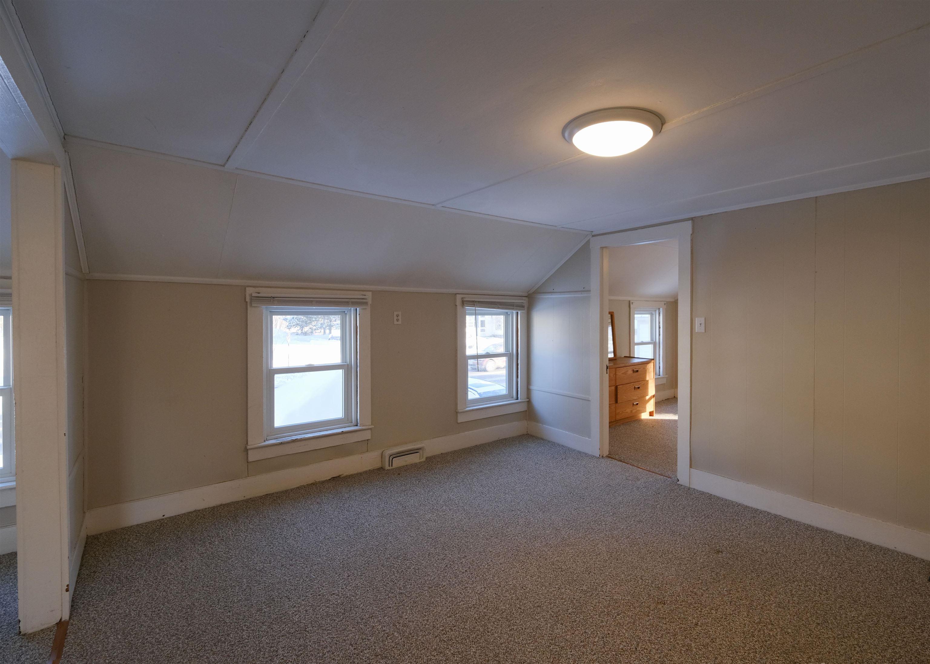 Unit 2 - Living/Dining Rooms - Door to enclosed porch 24660720