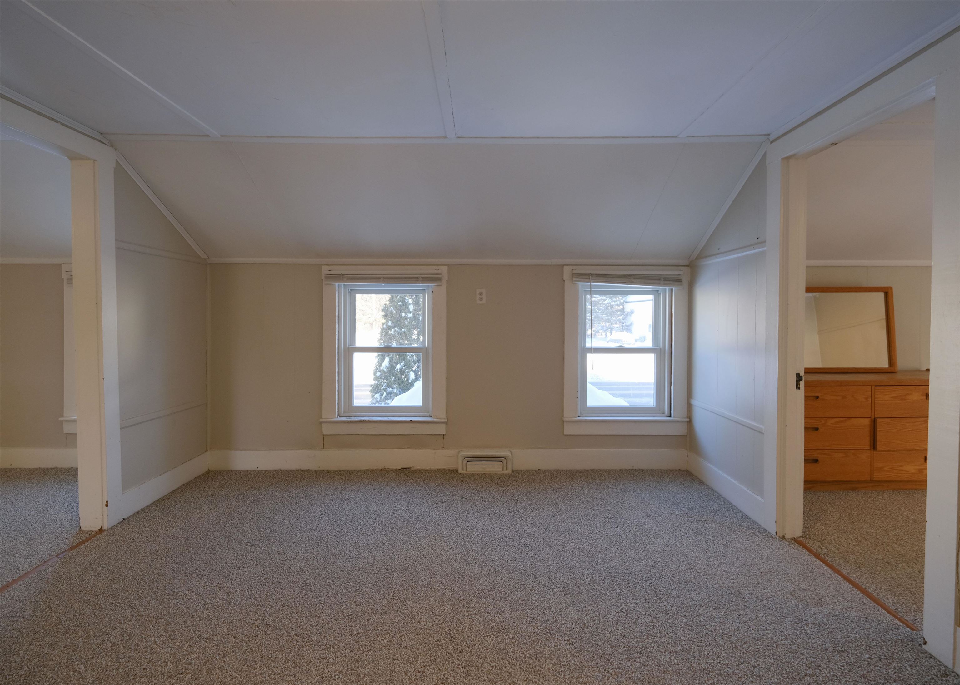 Unit 2 - Living/Dining Rooms - Door to enclosed porch 24660729