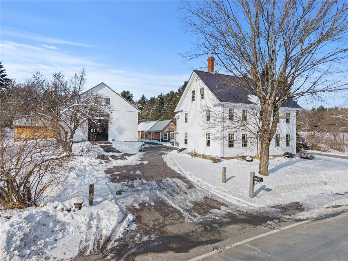 Trustee’s Sale at AUCTION (listed price is the assessed value being used as a place holder and not the auction price) Restored Colonial with Converted Post and Beam Barn on 1.52± Acres. Online-only Bidding Ends: Thursday, March 5th at 1:00 p.m.   76 Tsienneto Road is a beautifully restored 3,041 sq. ft. Colonial, originally built in 1835, that offers timeless character paired with thoughtful modern updates. The home features 5 bedrooms and 3 bathrooms, new Anderson windows throughout in 2019, a standing-seam metal roof, and the original wide pine wood floors. A completely rebuilt wood burning fireplace anchors the kitchen, complemented by a charming and operational beehive oven.  The outbuildings are truly exceptional, including a fully restored post-and-beam barn, which was lifted off its original stone foundation to be replaced by an insulated, poured concrete slab with granite sills. The heated barn features a seasonal kitchen, multiple sitting areas, space for games, and a U-shaped mezzanine—making it ideal for entertaining large groups in comfort.  Additional amenities include a detached, heated single-car barn also with new foundation and a multi-bay, drive-in heated motorcycle and toy garage with an attached tool and garden shed. Terms: A $10,000 deposit by check or e-check will be delivered to the auction company as a qualification to bid. Successful bidder to deliver earnest money totaling 10% of the total purchase price no later than, March 6th with the balance due at closing within 45 days of the auction. A 10% buyer’s premium will be added to the high bid price to become the total purchase price. Property is being sold free and clear of all liens. Offered subject to confirmation of the Trustee. Delayed showings start 2/19