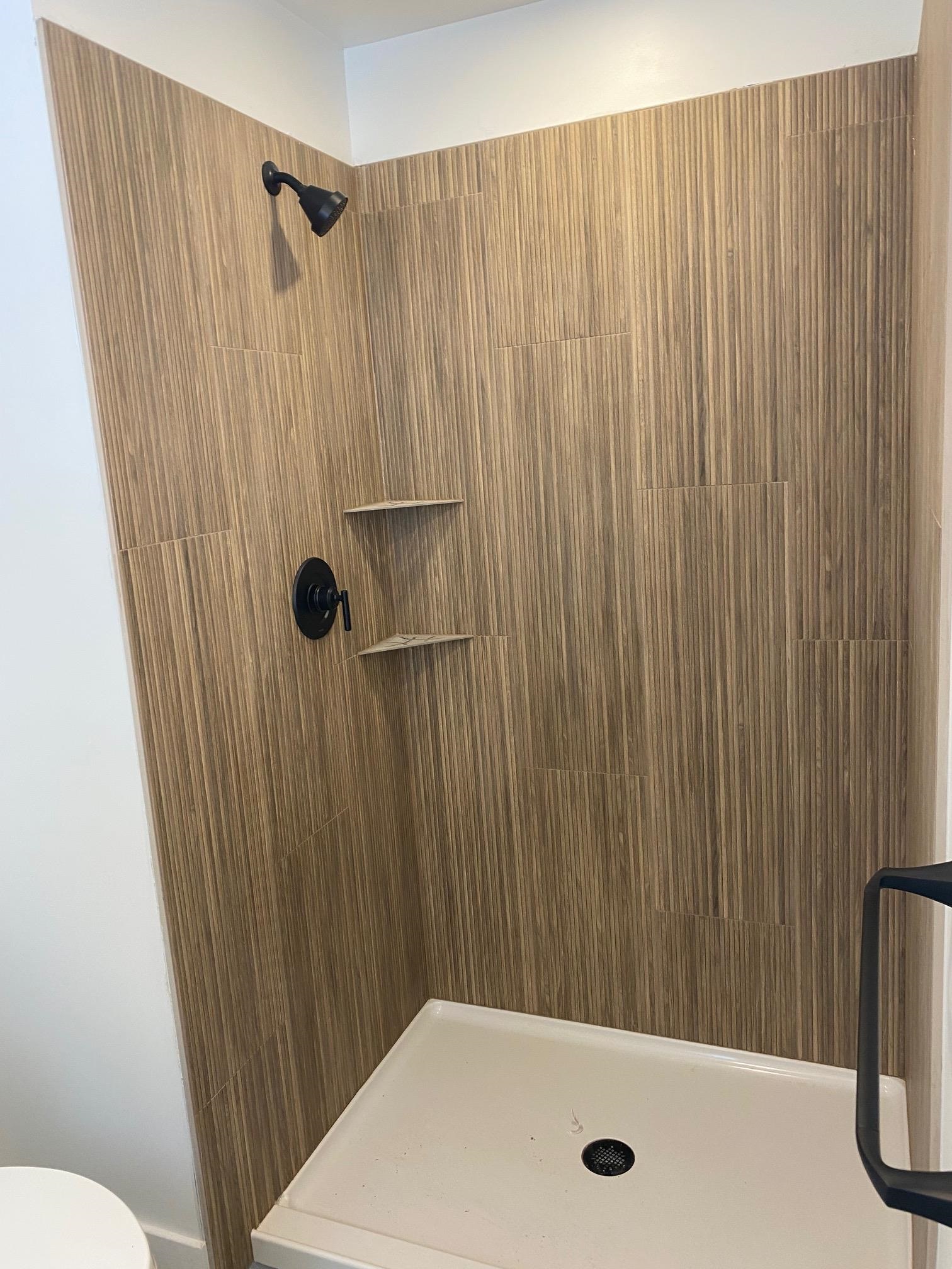 Primary suite custom tiled bathroom 24792469